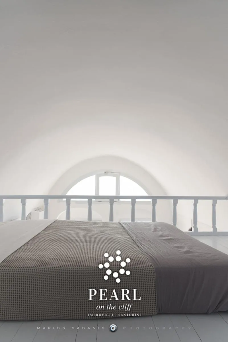 Bed in Pearl on the Cliff Hotel & Suites by Pearl Hotel Collection