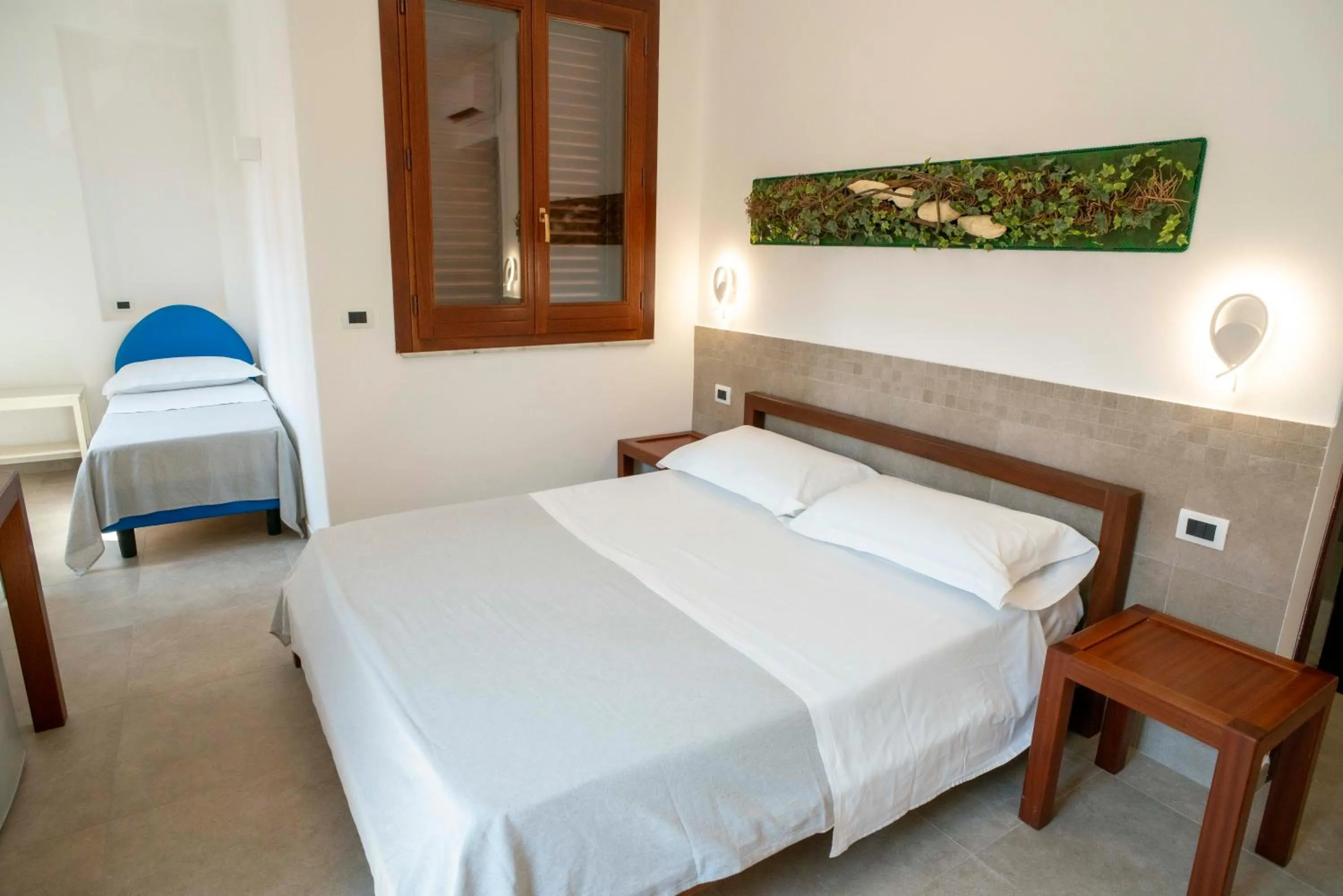 View (from property/room), Bed in Petit Hotel