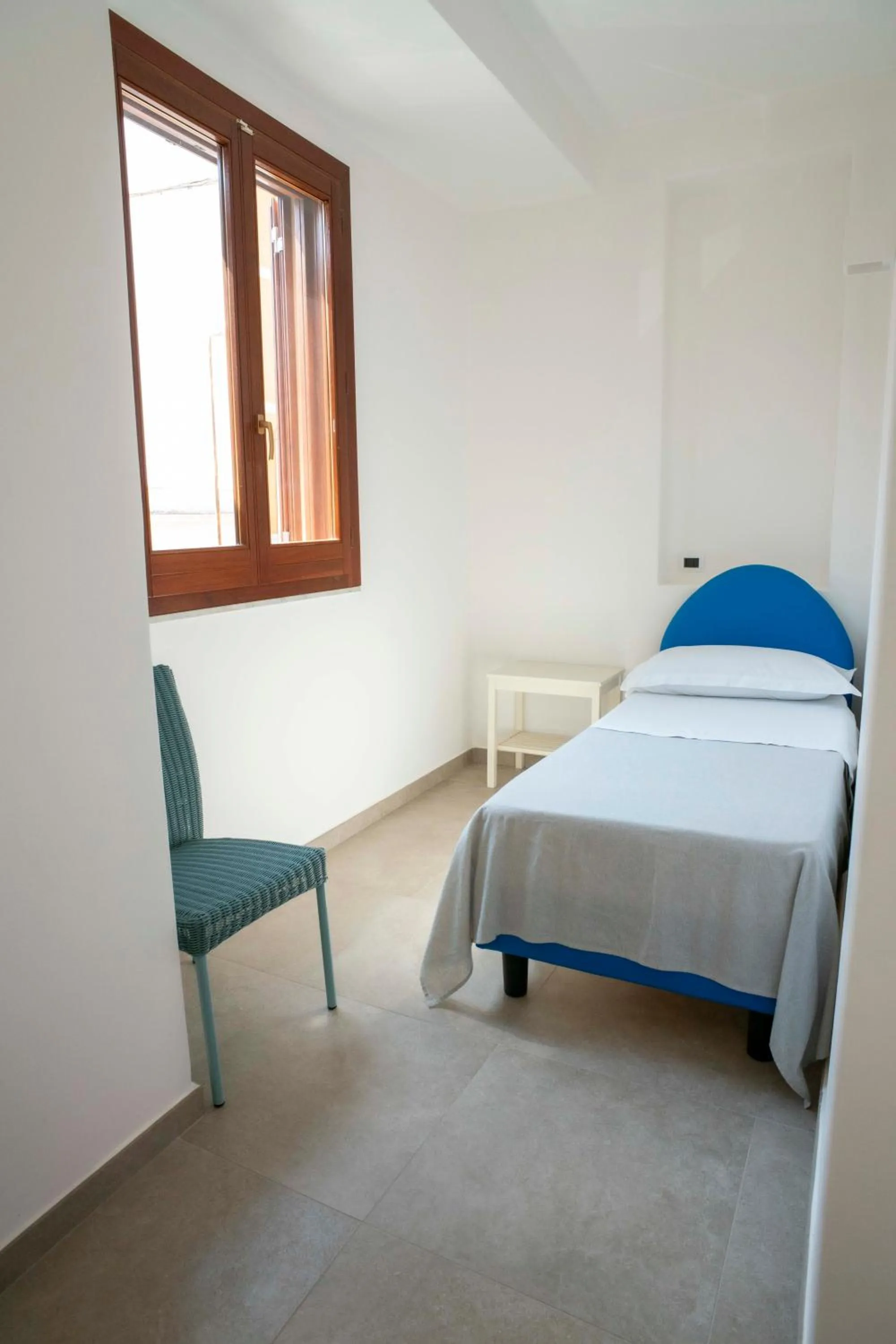 View (from property/room), Bed in Petit Hotel