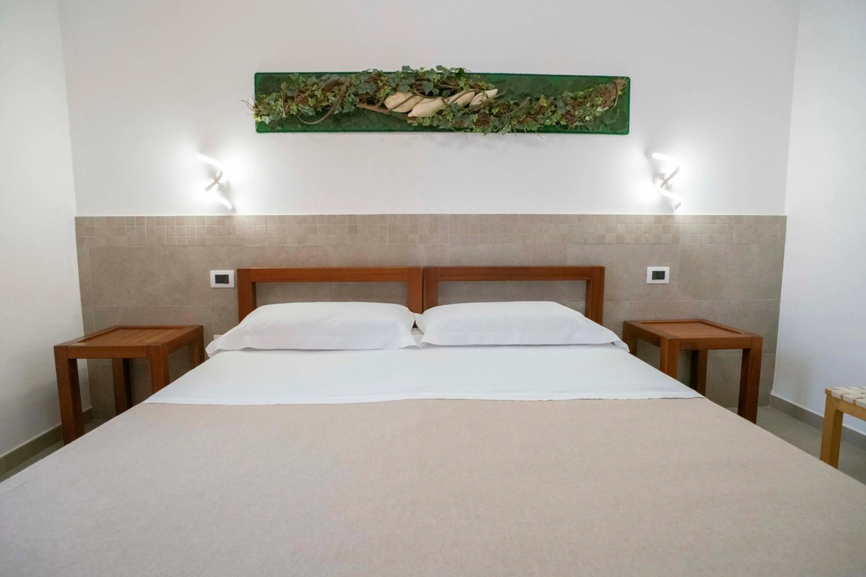 View (from property/room), Bed in Petit Hotel