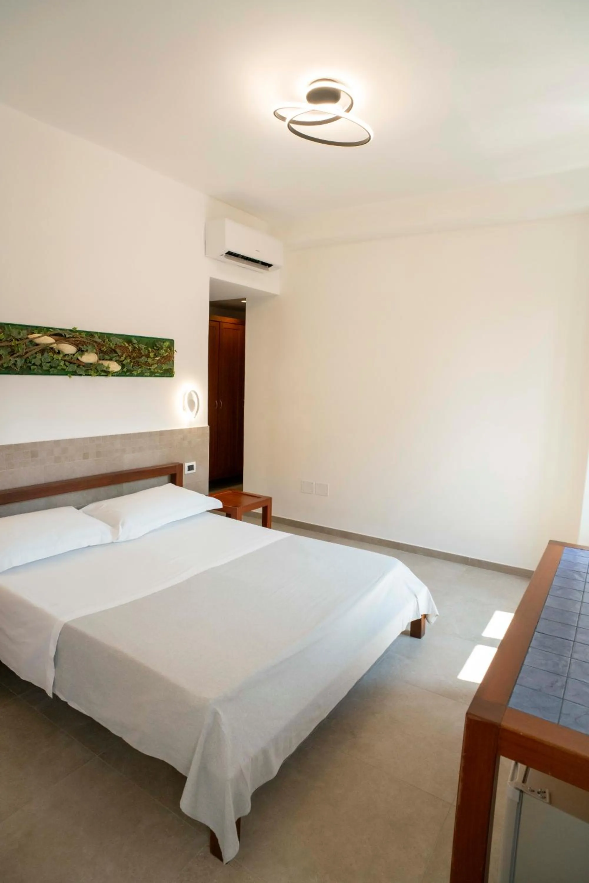 View (from property/room), Bed in Petit Hotel