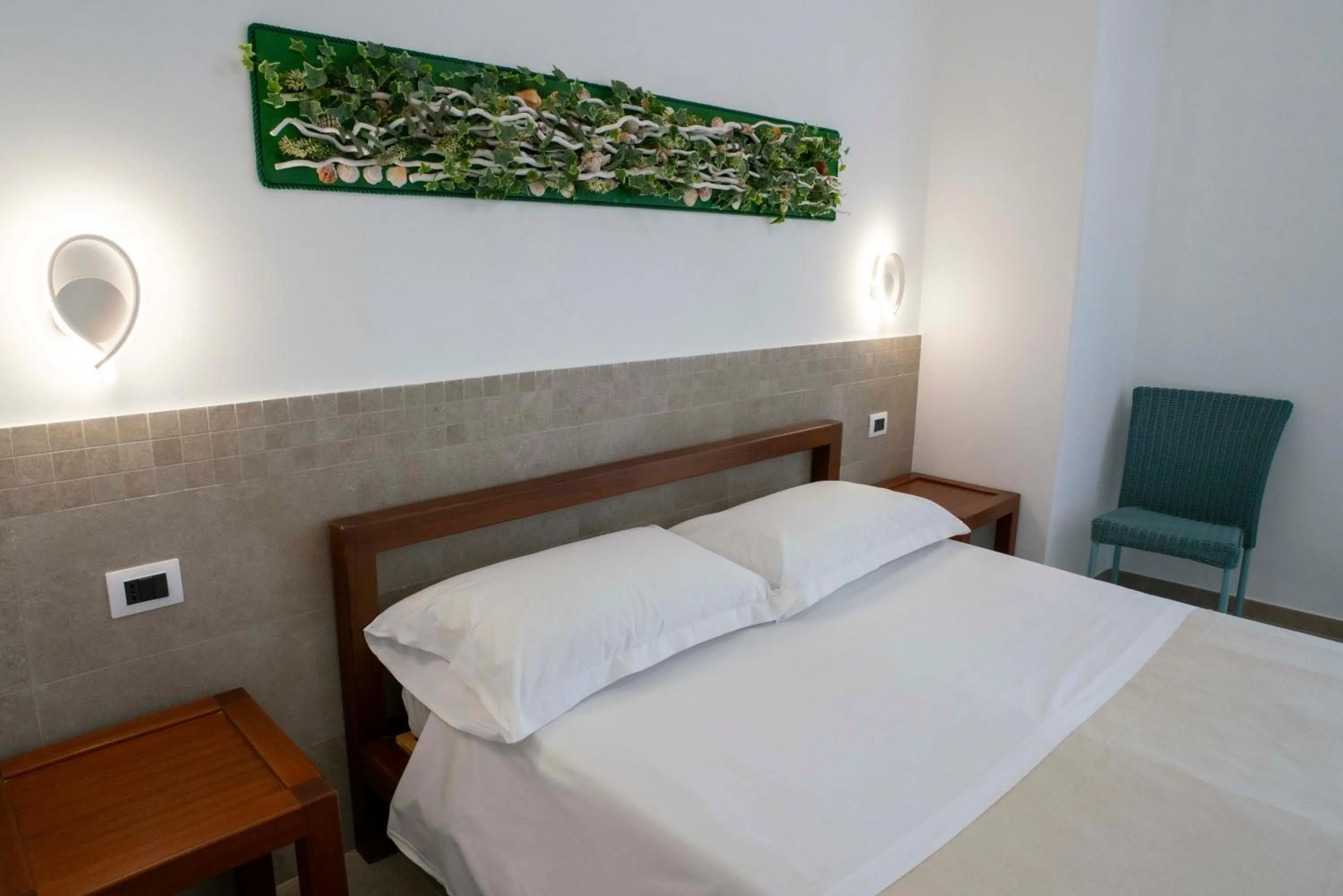 View (from property/room), Bed in Petit Hotel