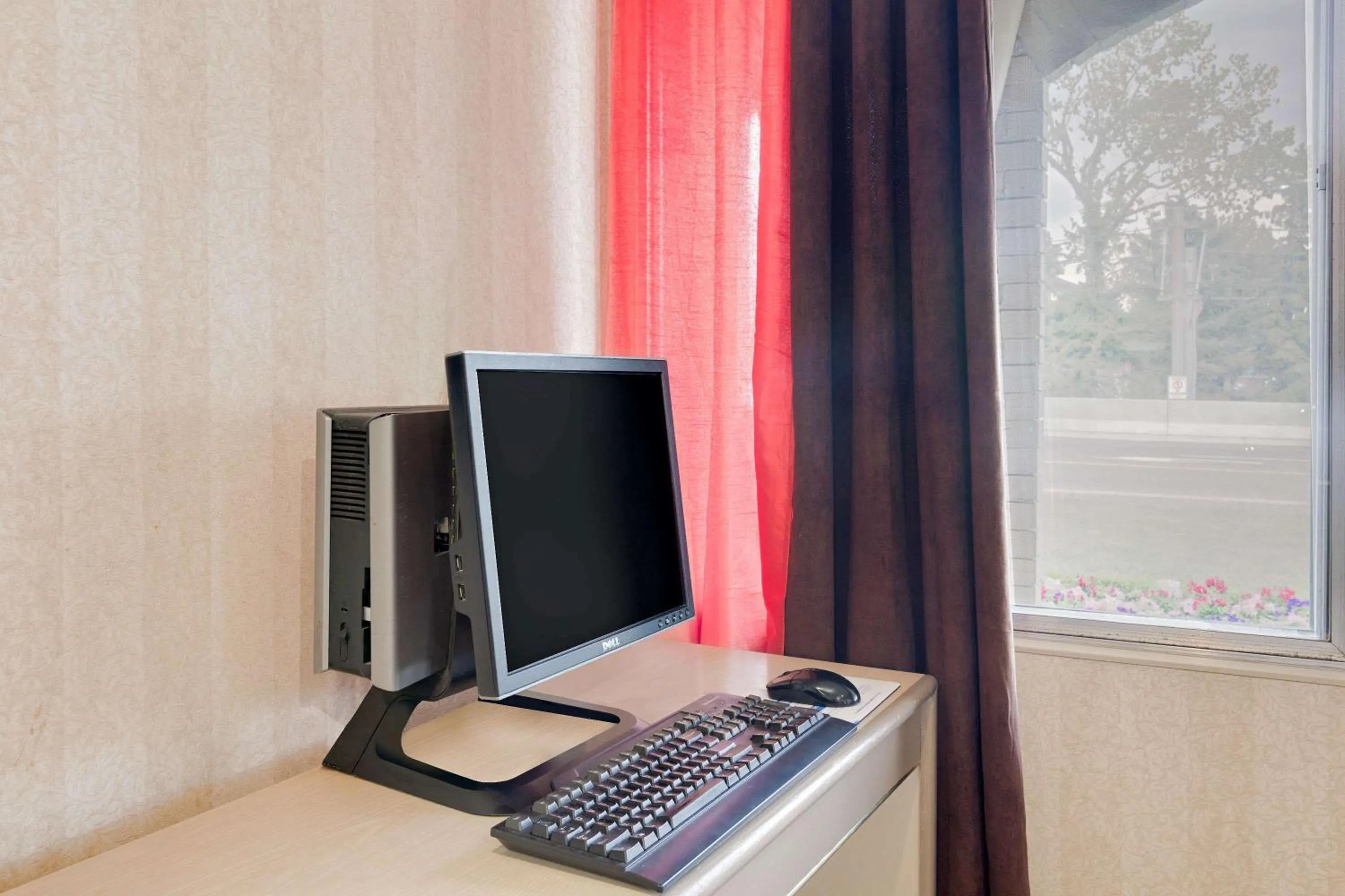 On site, TV/Entertainment Center in Ramada Limited Calgary