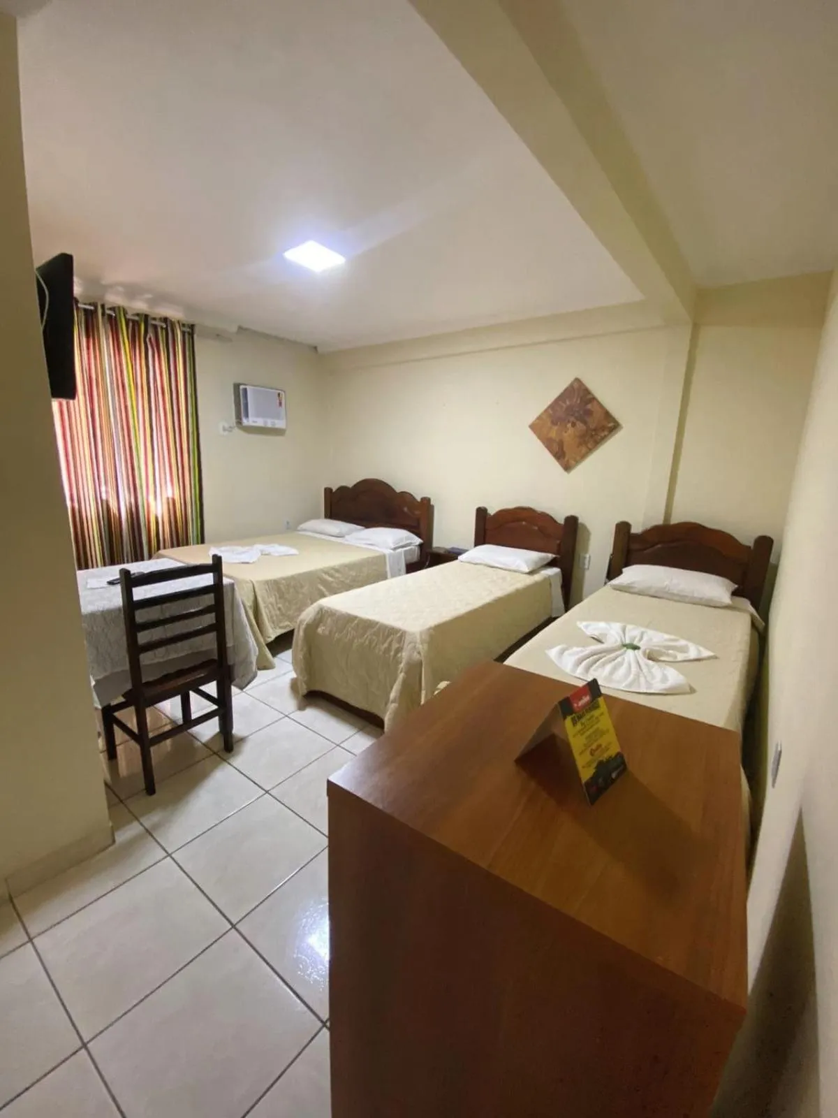 Bed in Pousada Dom Fernandes