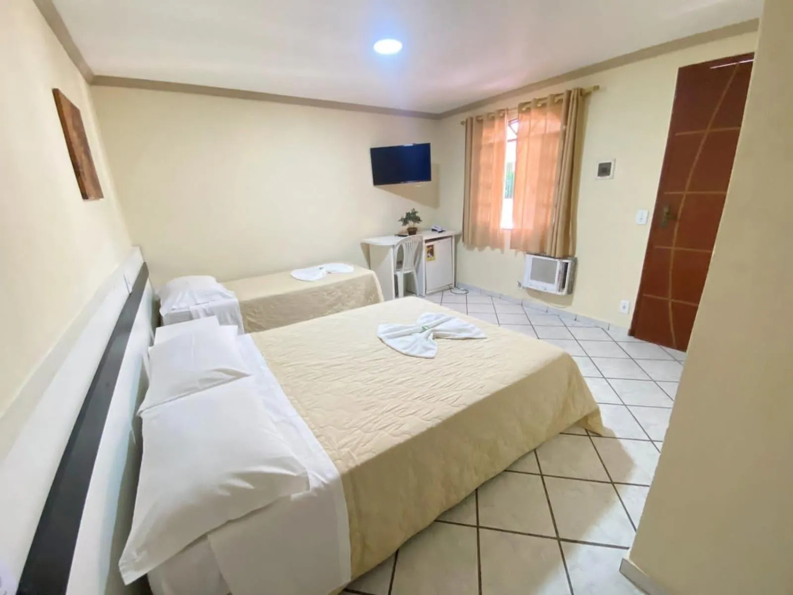 Bed in Pousada Dom Fernandes