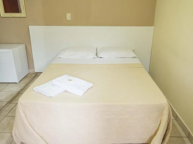 Bed in Pousada Dom Fernandes