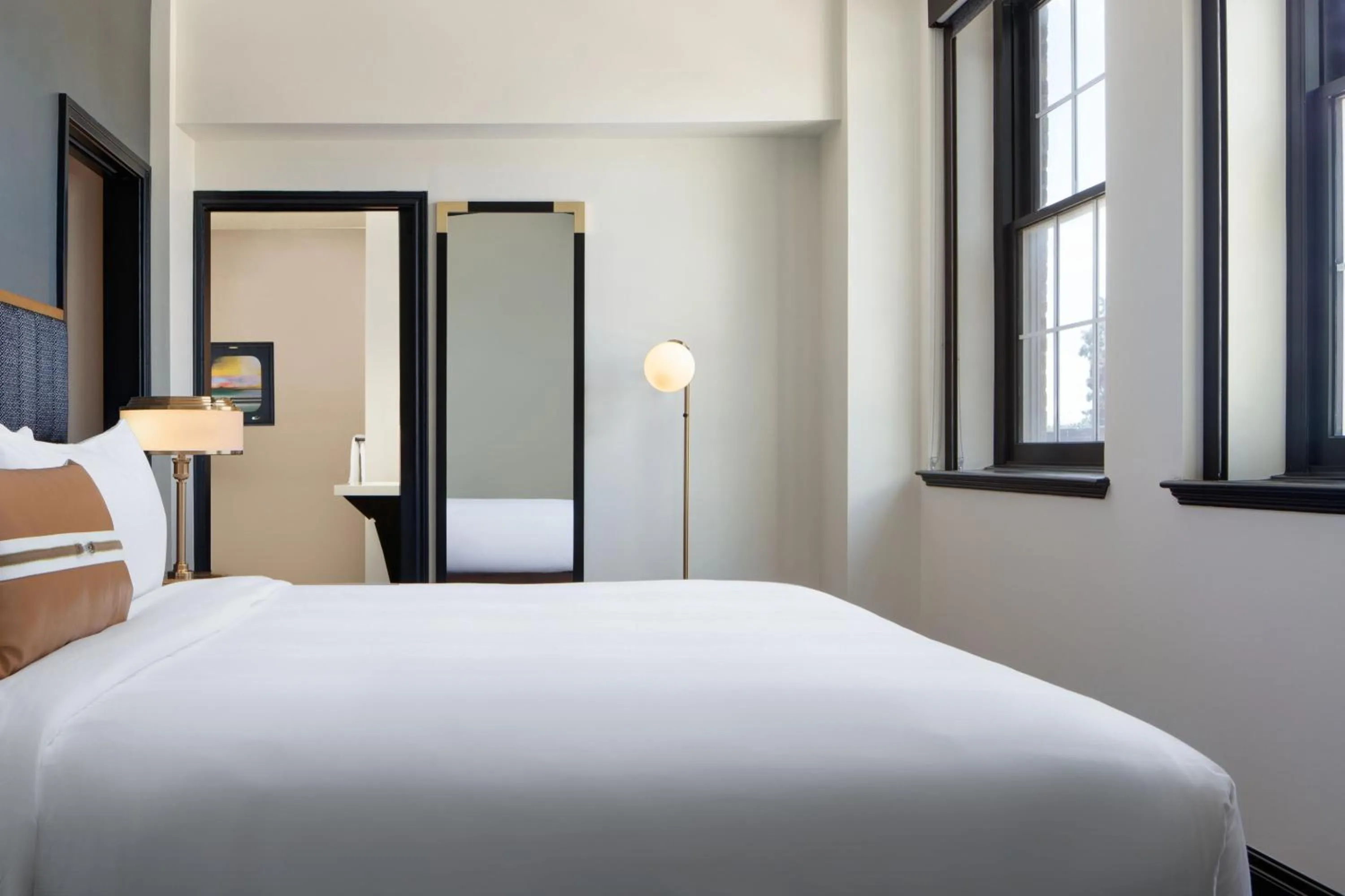 Photo of the whole room, Bed in The LaSalle Hotel, Bryan College Station, a Tribute Portfolio Hotel