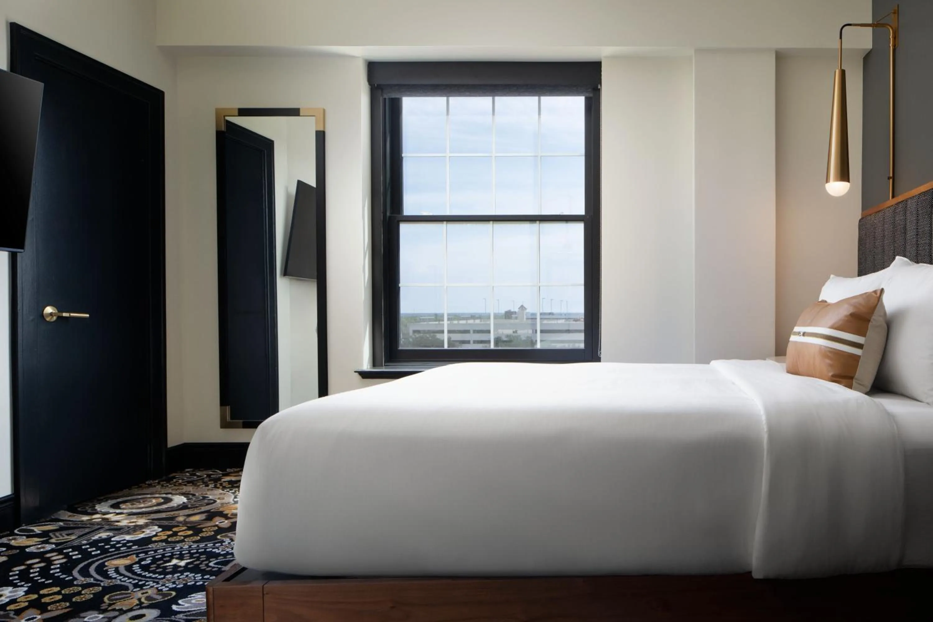 Photo of the whole room, Bed in The LaSalle Hotel, Bryan College Station, a Tribute Portfolio Hotel