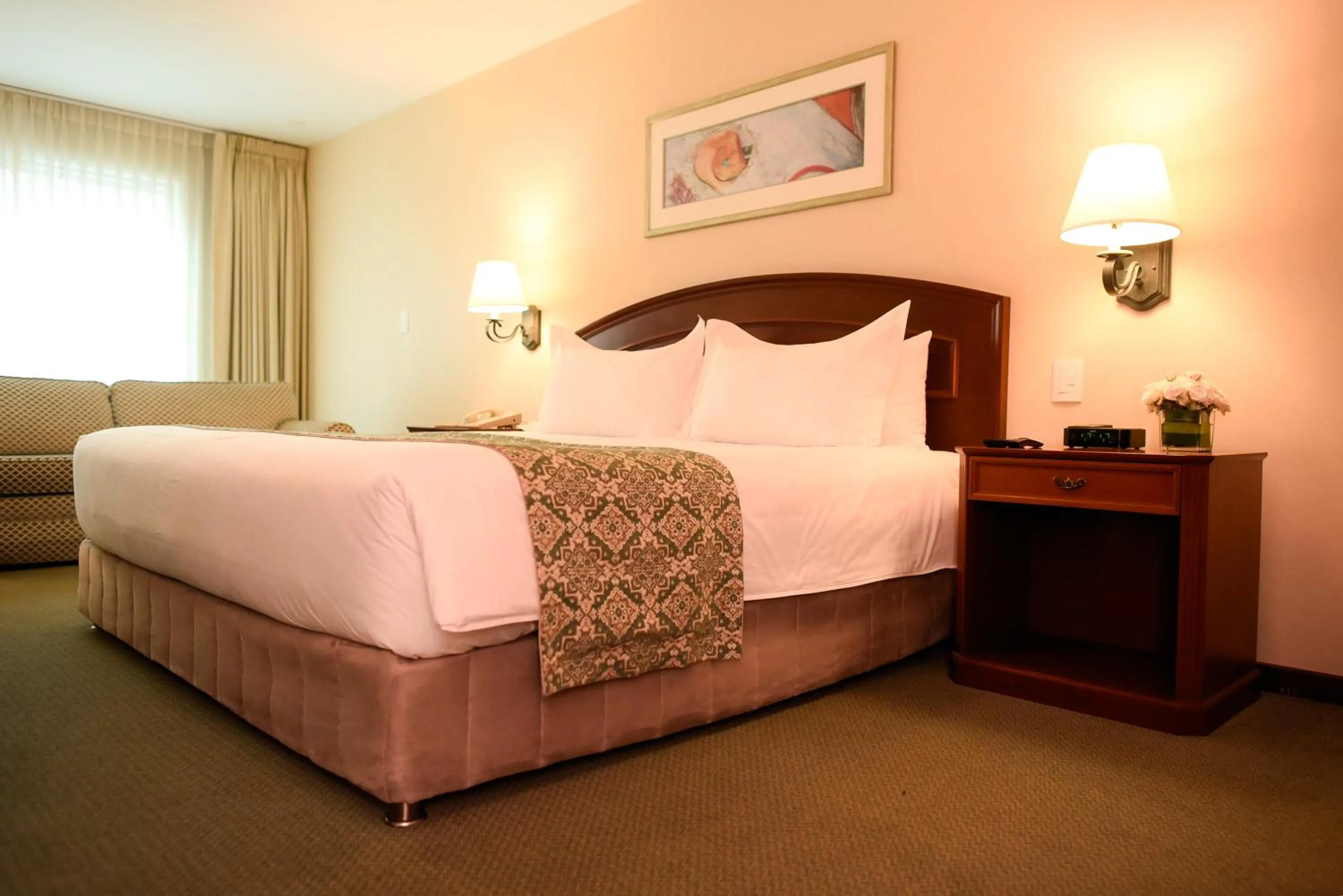 Bed in Los Tallanes Hotel & Suites