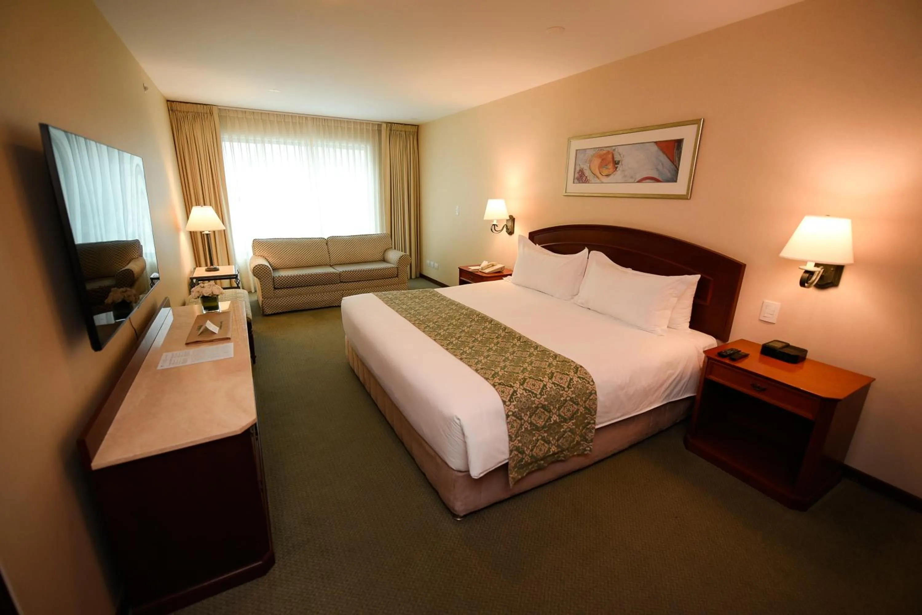 Bed in Los Tallanes Hotel & Suites