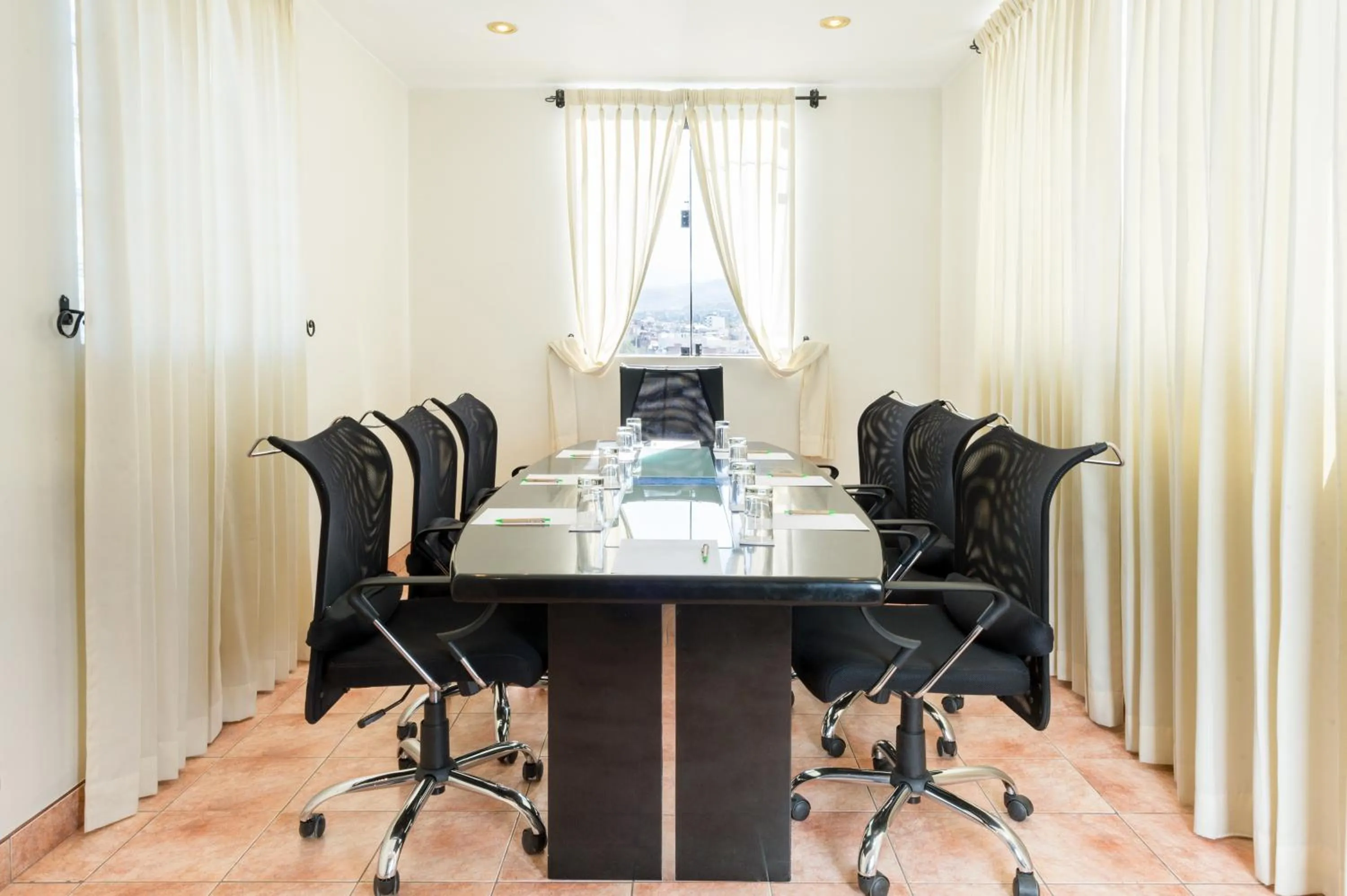 Area and facilities in Natura Inn Hotel