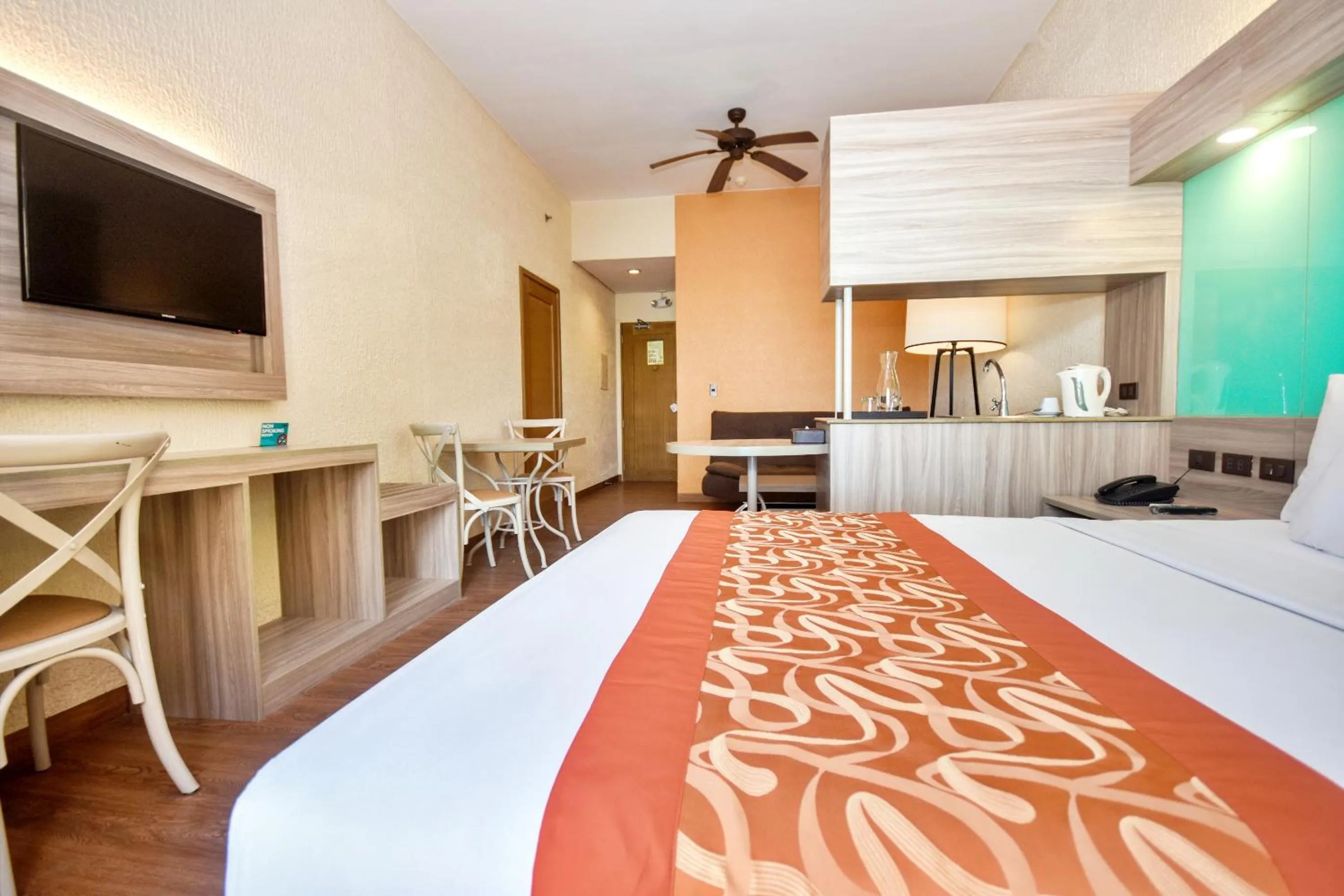 Bed in Microtel by Wyndham Boracay