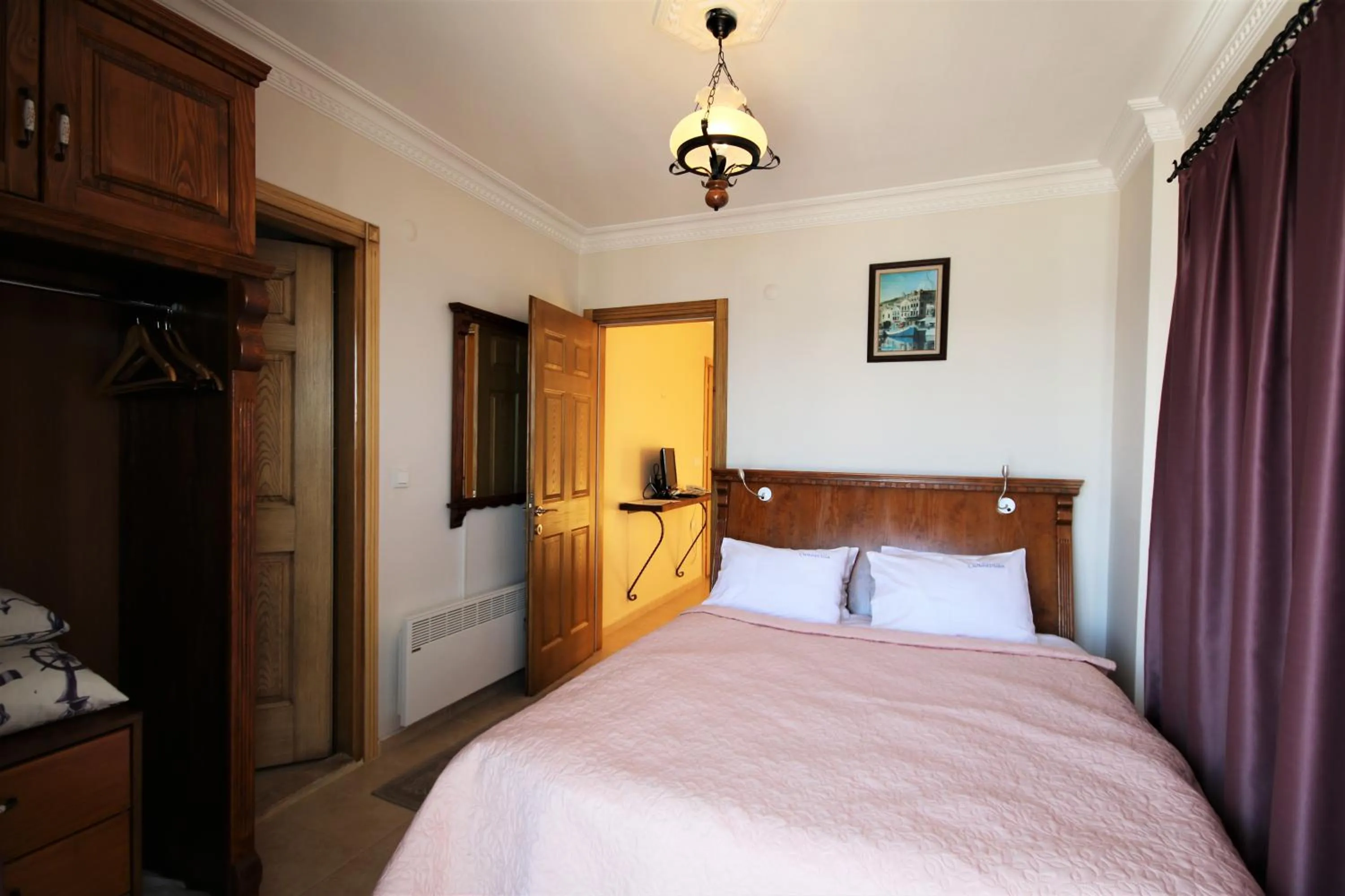 Bed in Cundavilla Hotel & Suites