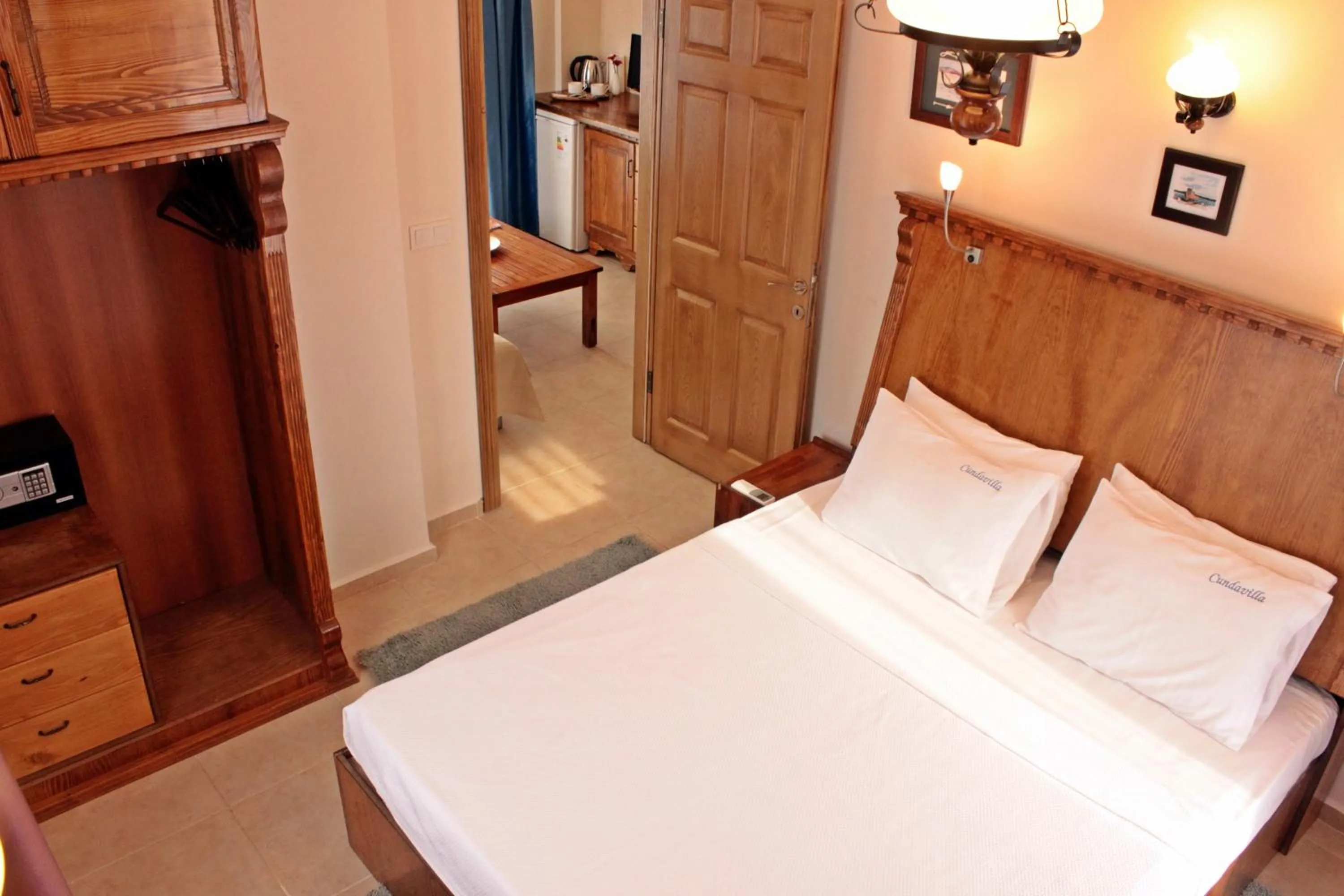 Bed in Cundavilla Hotel & Suites
