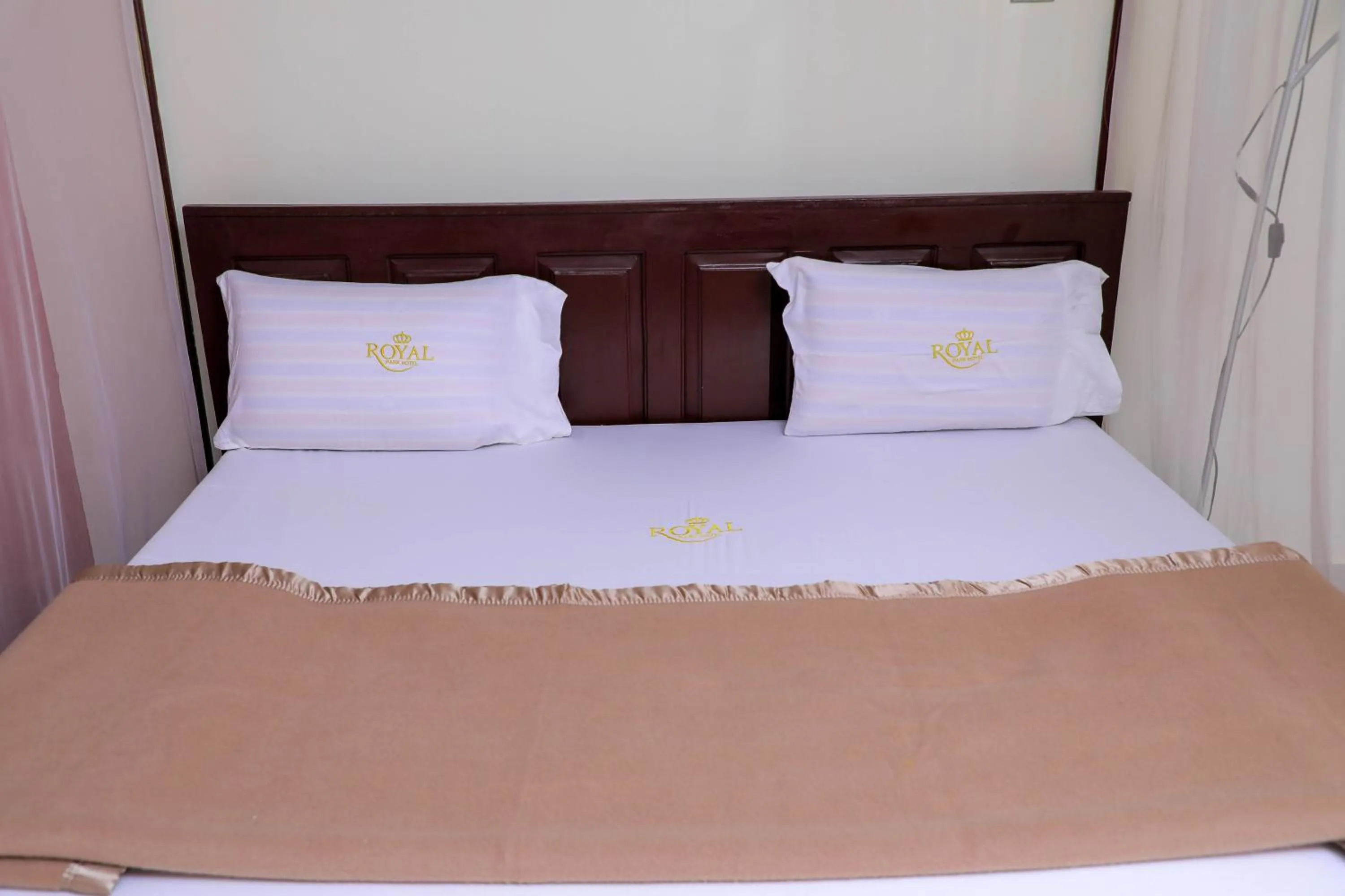 Bed in Royal Park Hotel