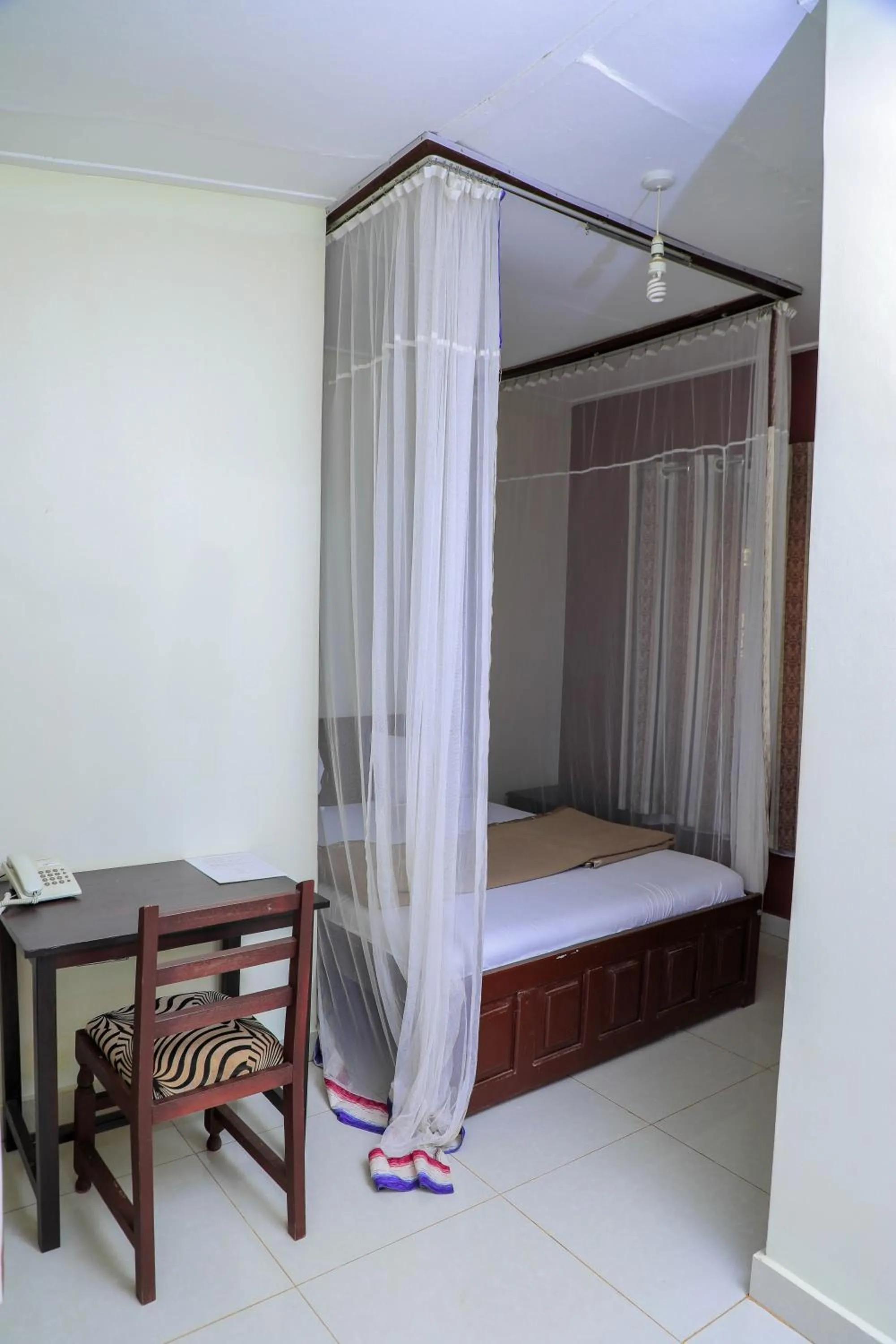 Bed in Royal Park Hotel