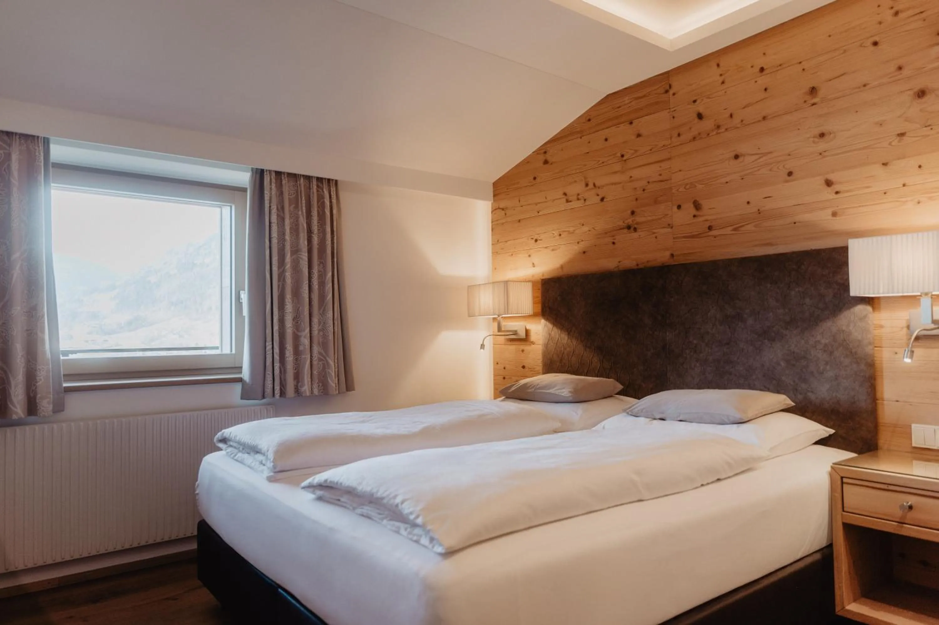 Bed in Hotel Berghof - St Johann in Salzburg