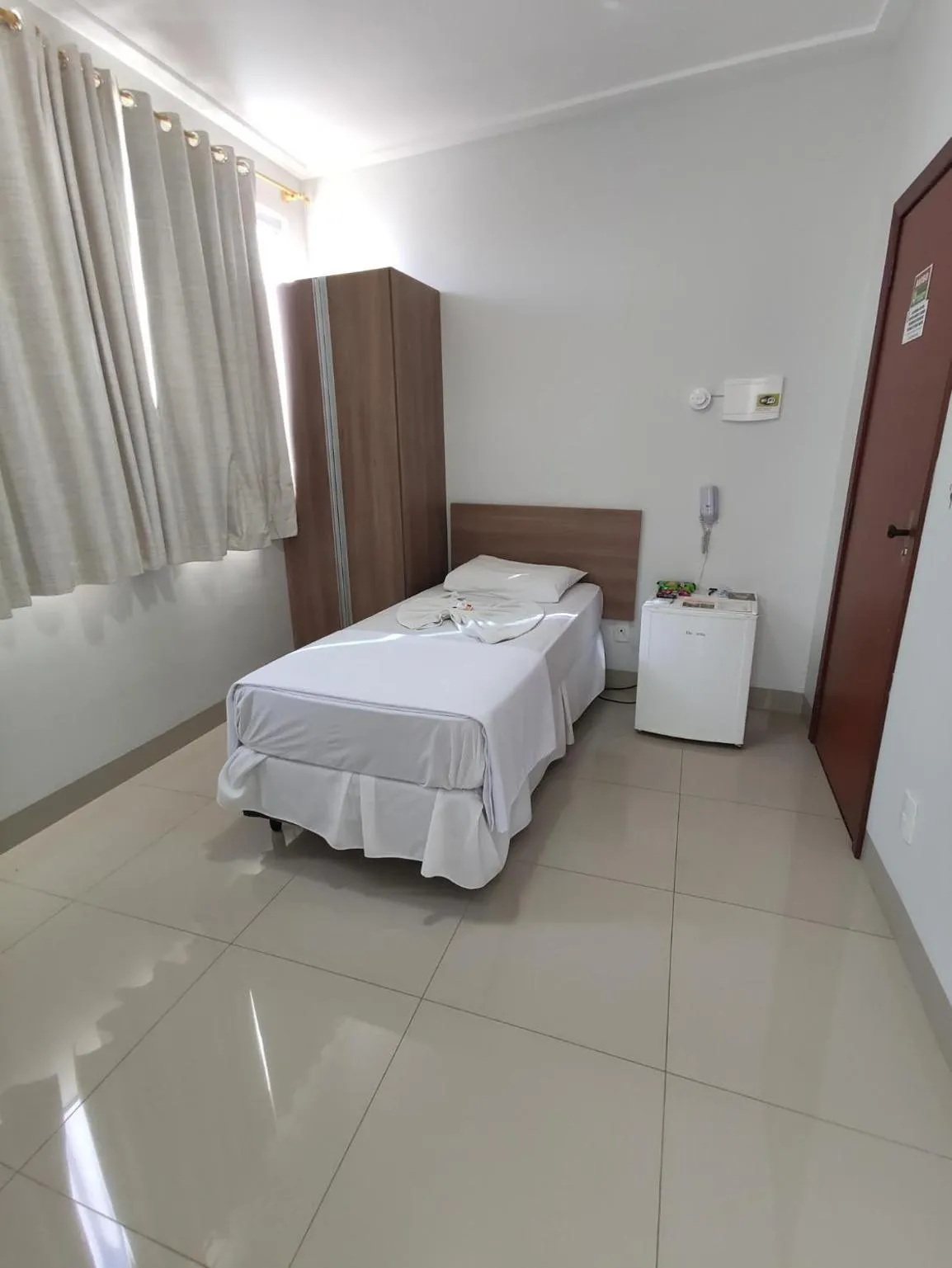 Bed in Cemarim Hotel