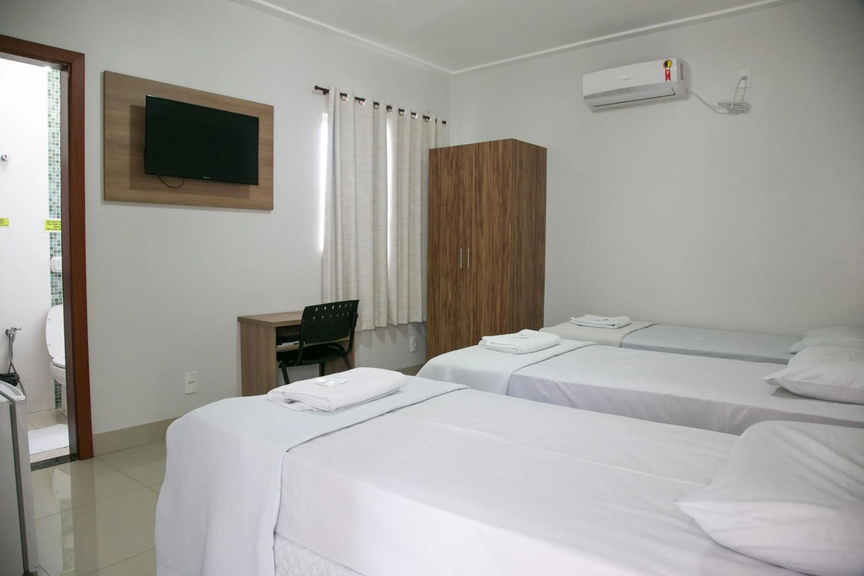 Bed in Cemarim Hotel