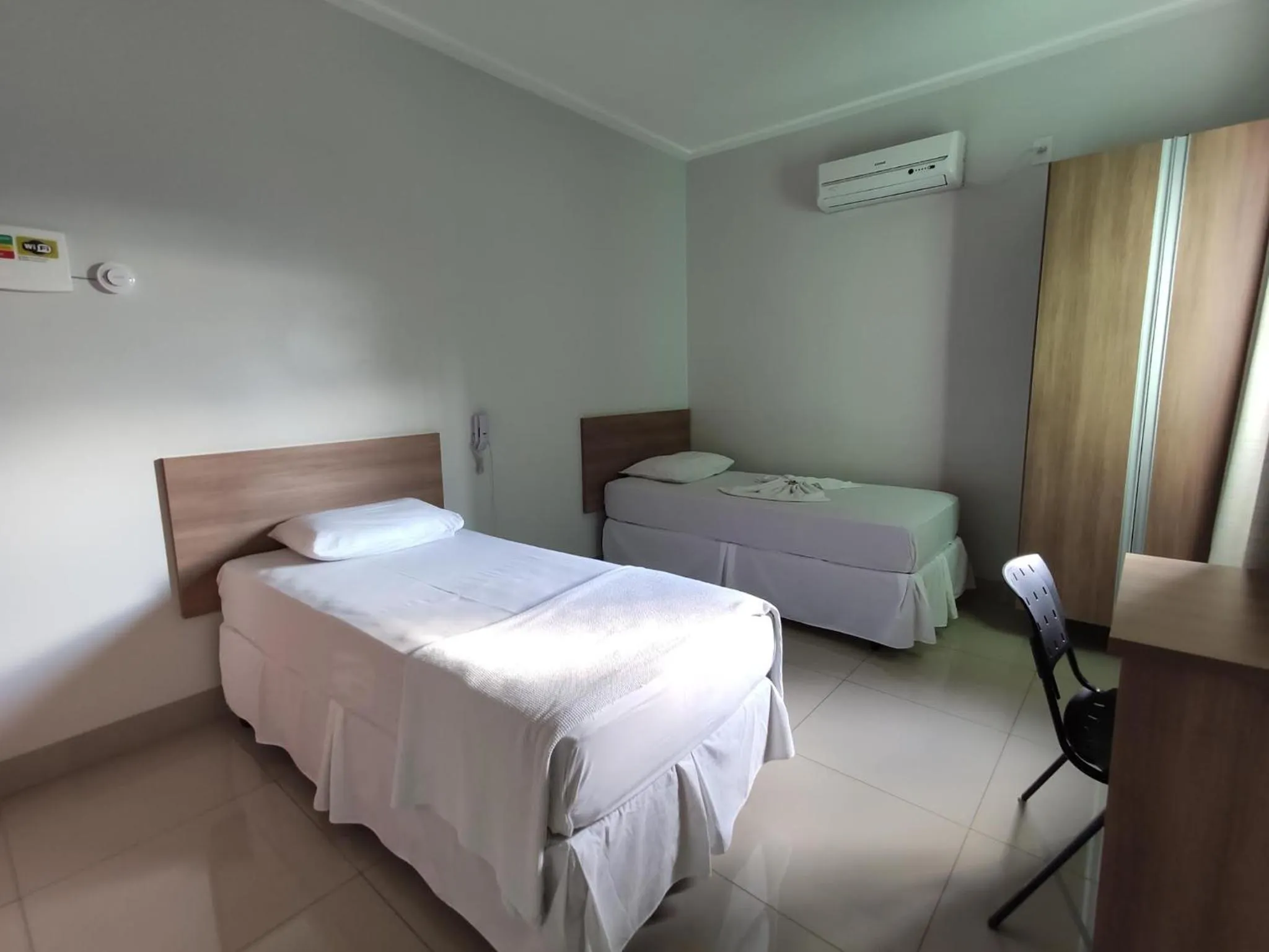 Bed in Cemarim Hotel