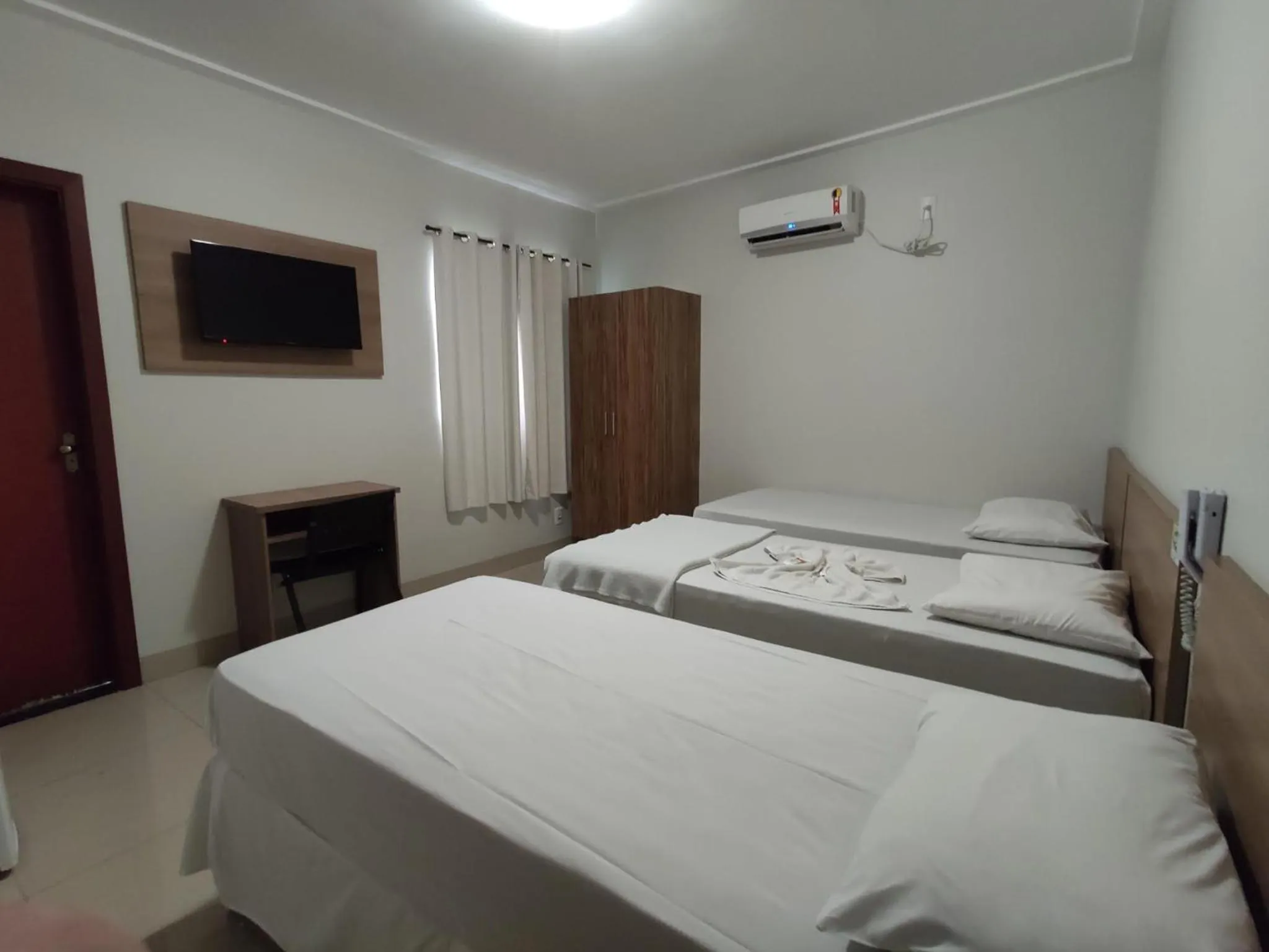 Bed in Cemarim Hotel