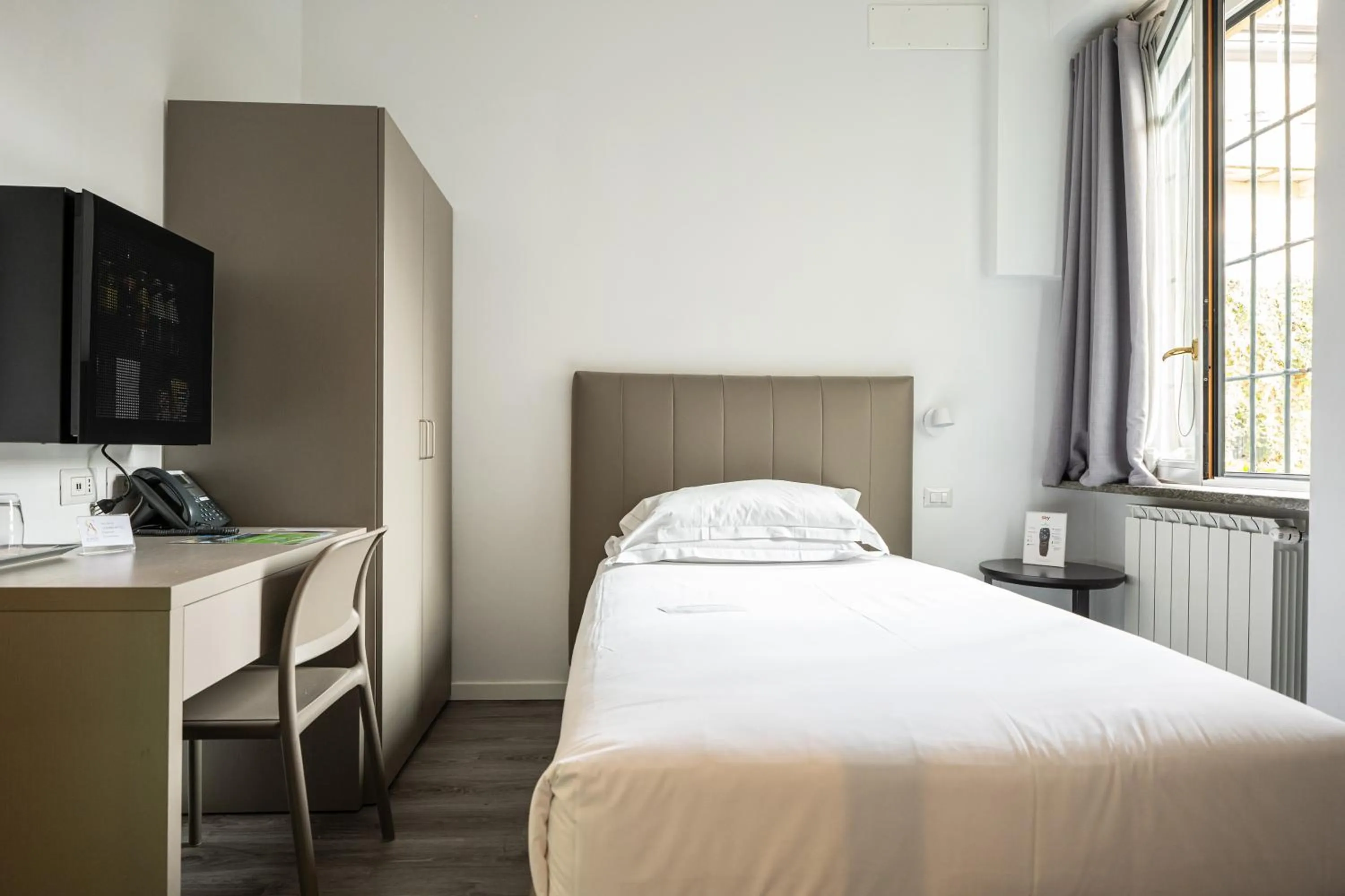 Bed in Ai Suma Hotel