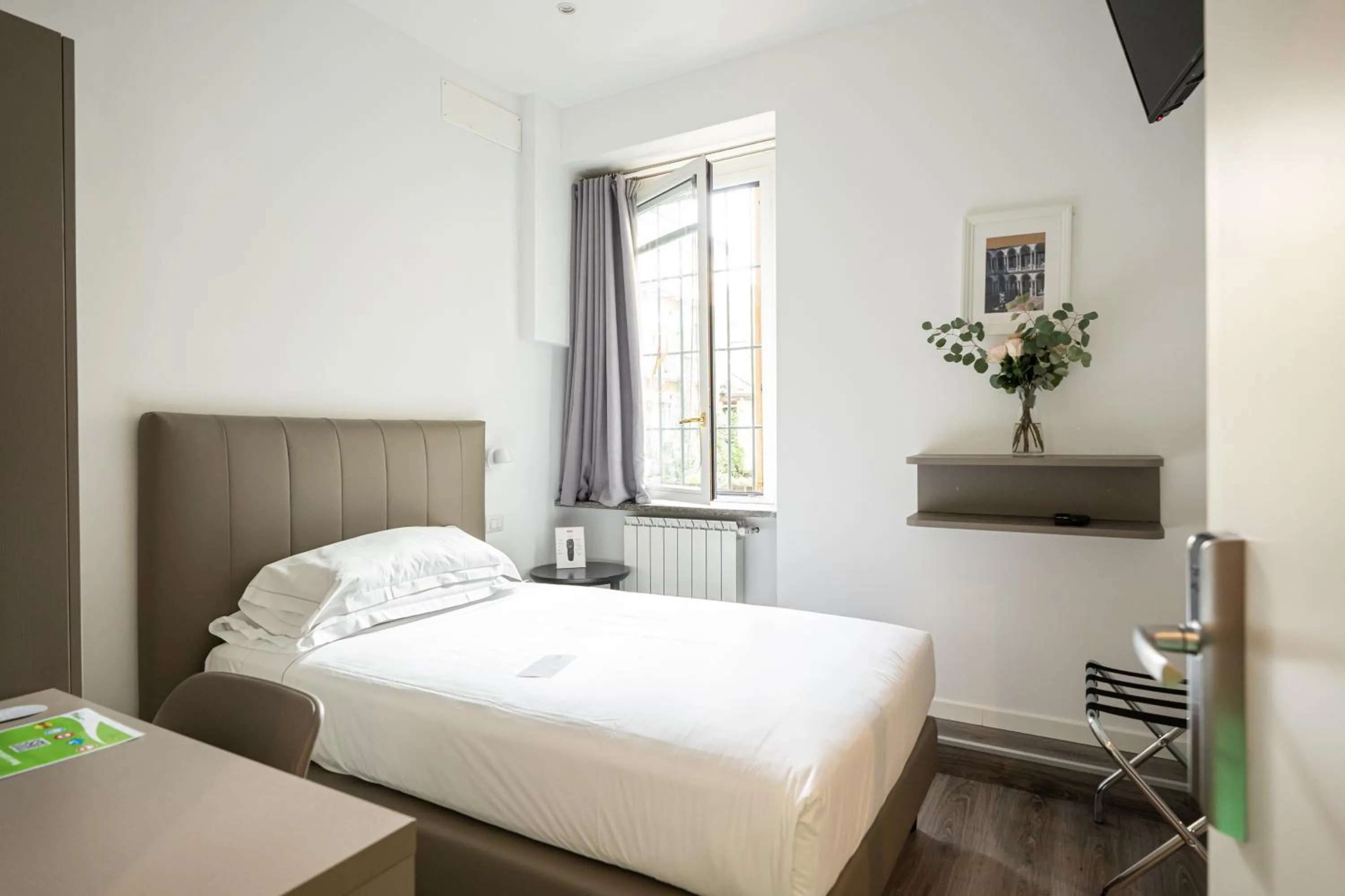 Bed in Ai Suma Hotel