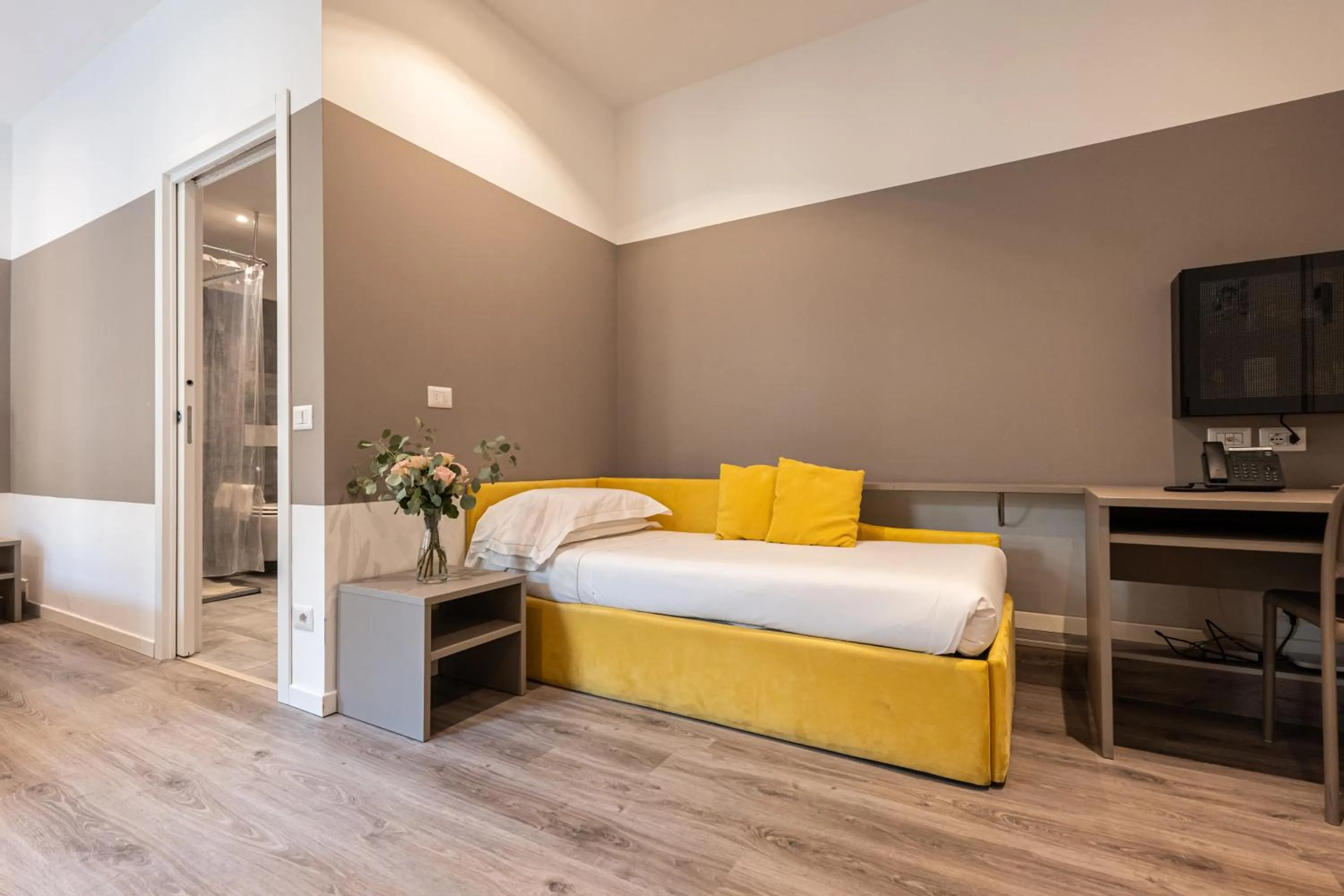 Bed in Ai Suma Hotel