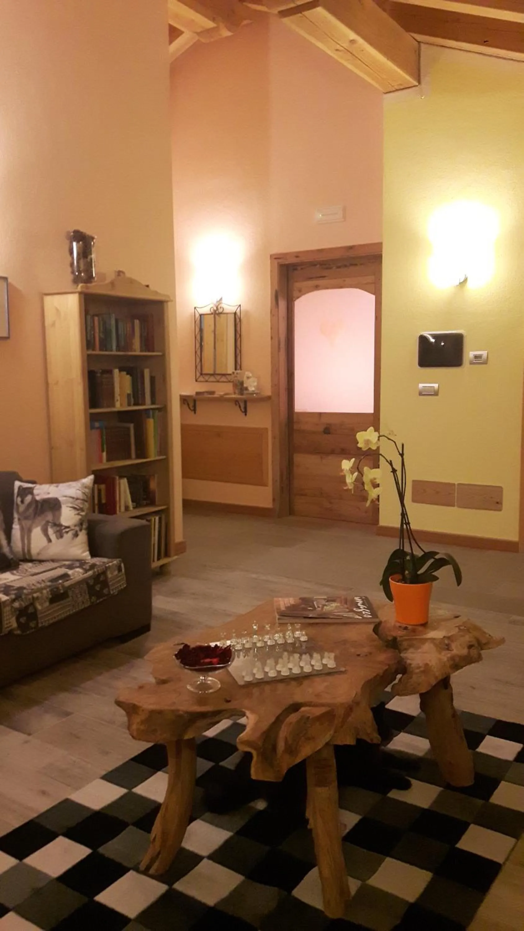 Communal lounge/ TV room in La locanda del Mulino