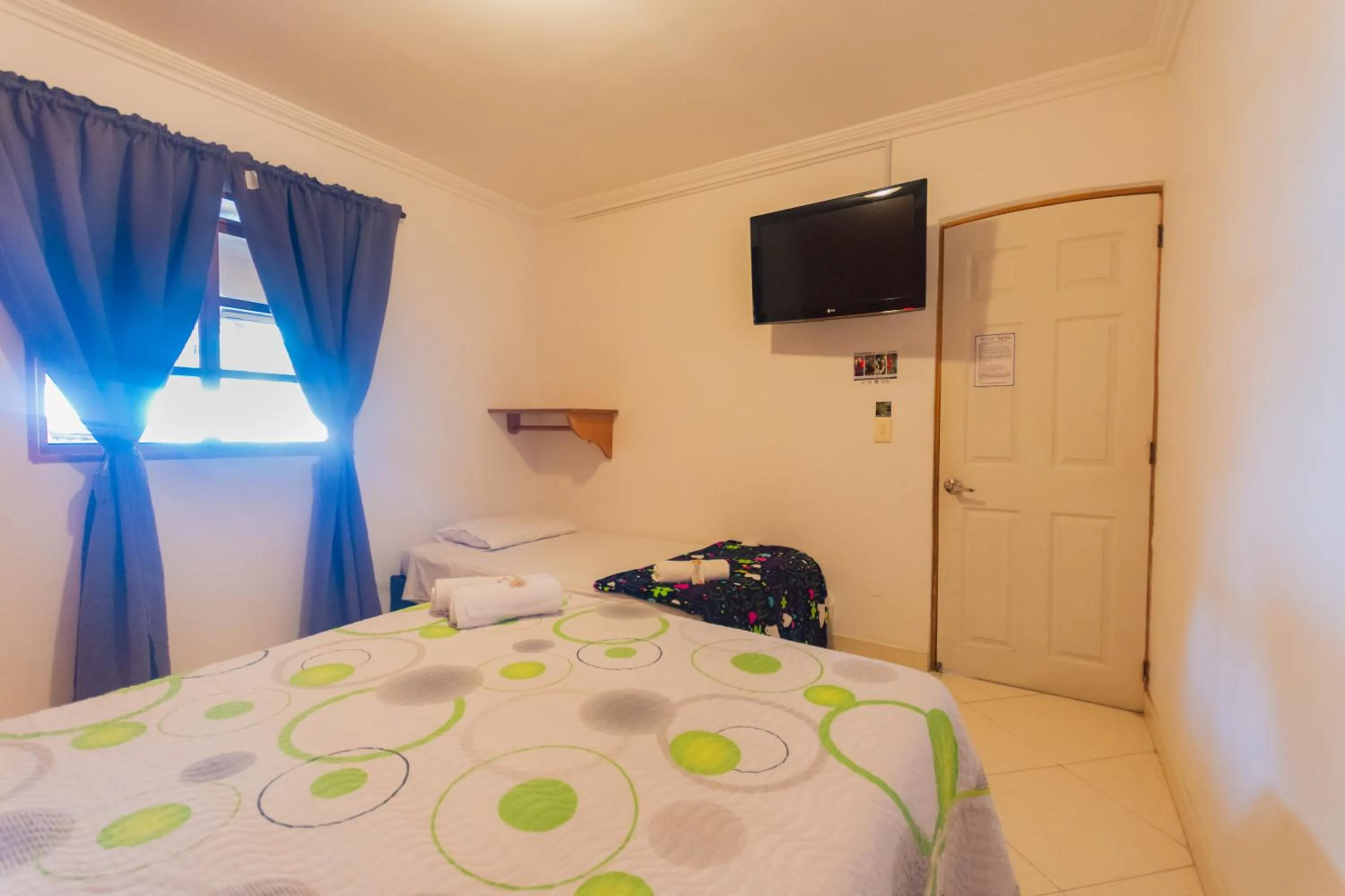 Bed in Hotel Real Guatapé