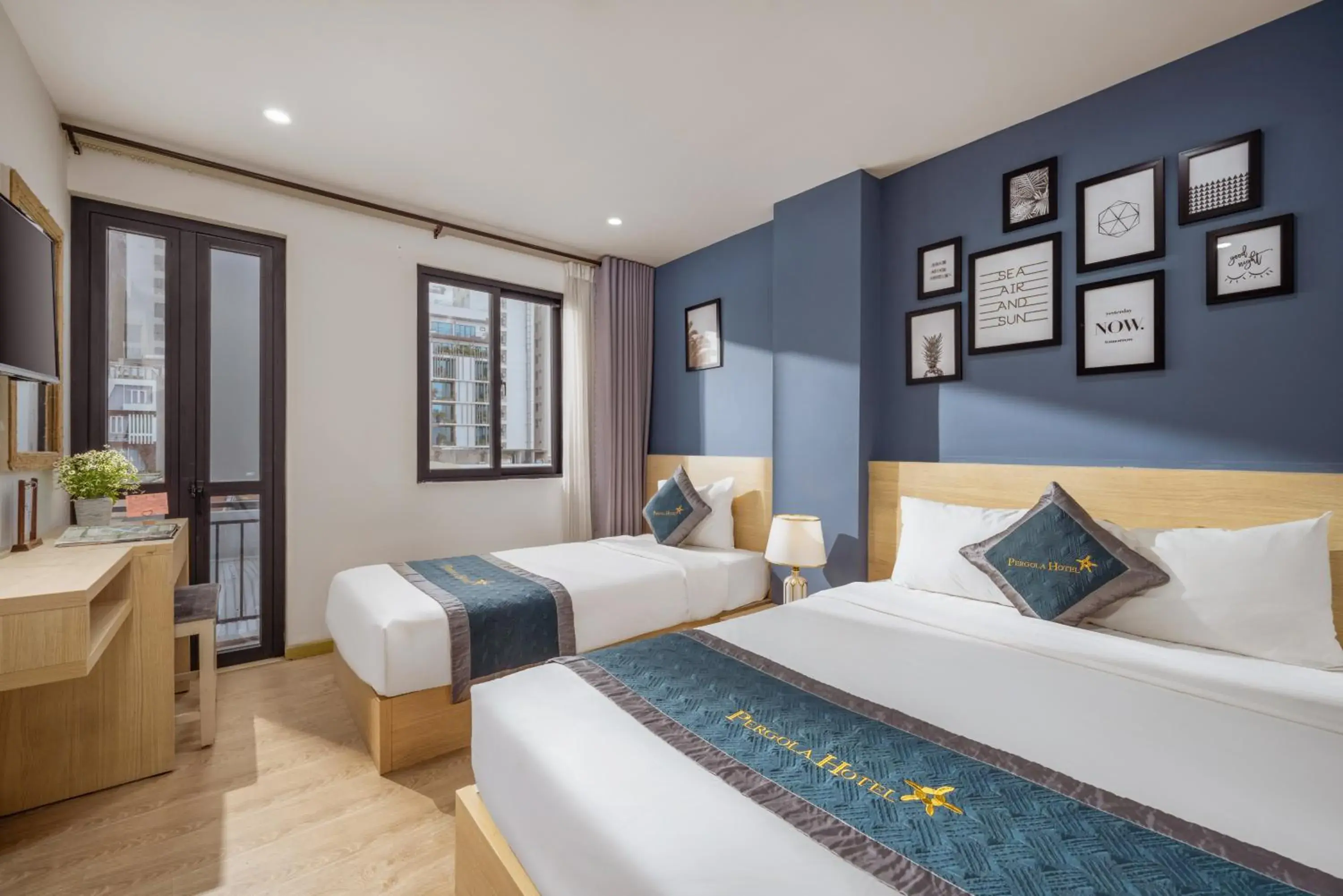 Deluxe Triple Room in The Pergola Design Hotel Deluxe Triple Room in The Pergola Design Hotel