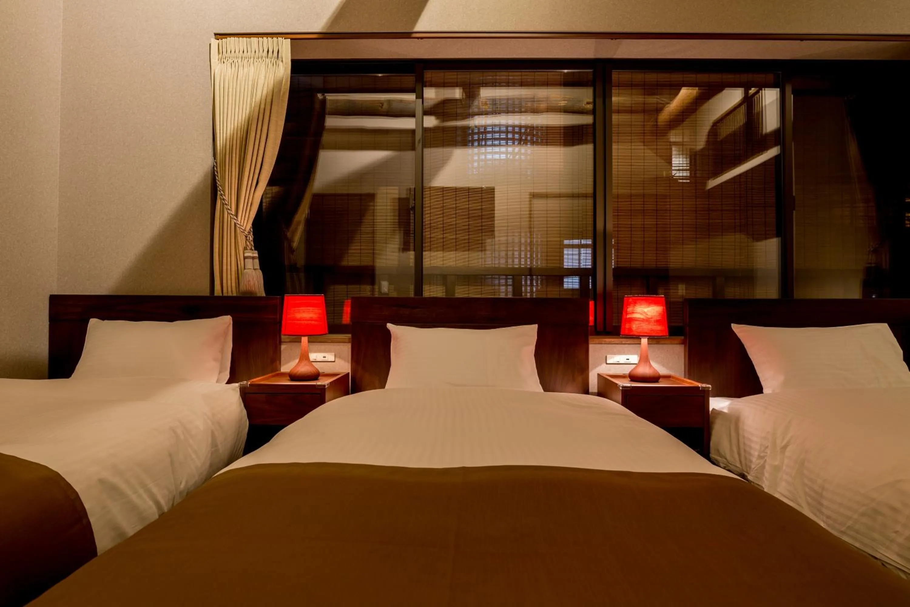 Bed in RESI STAY NISHIKI