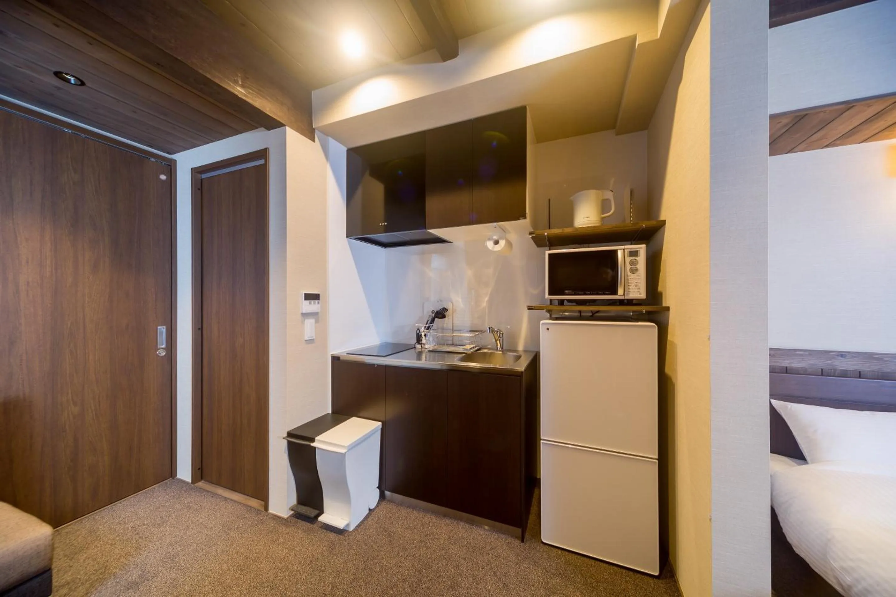 Kitchen or kitchenette, Bed in RESI STAY NISHIKI