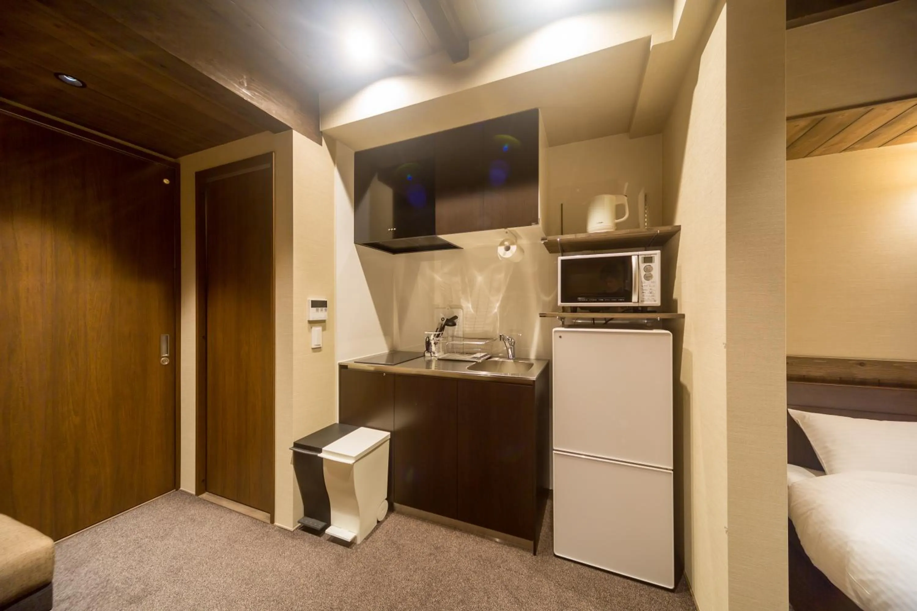 Kitchen or kitchenette, Bed in RESI STAY NISHIKI