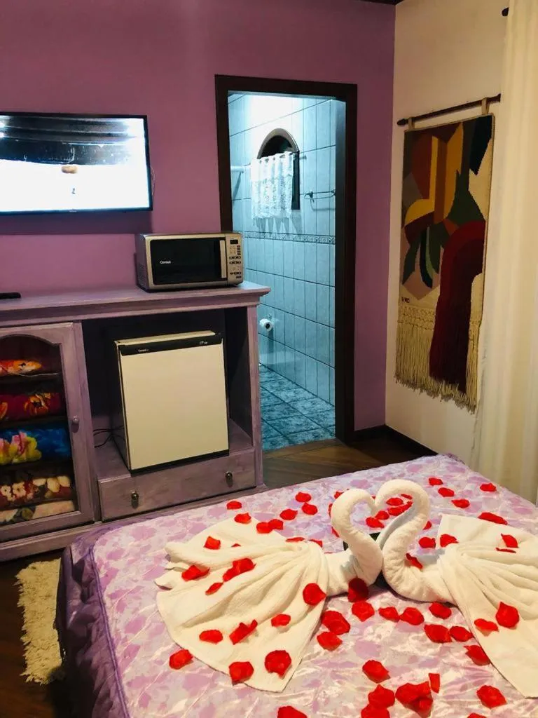 Bed in Chalé de Férias