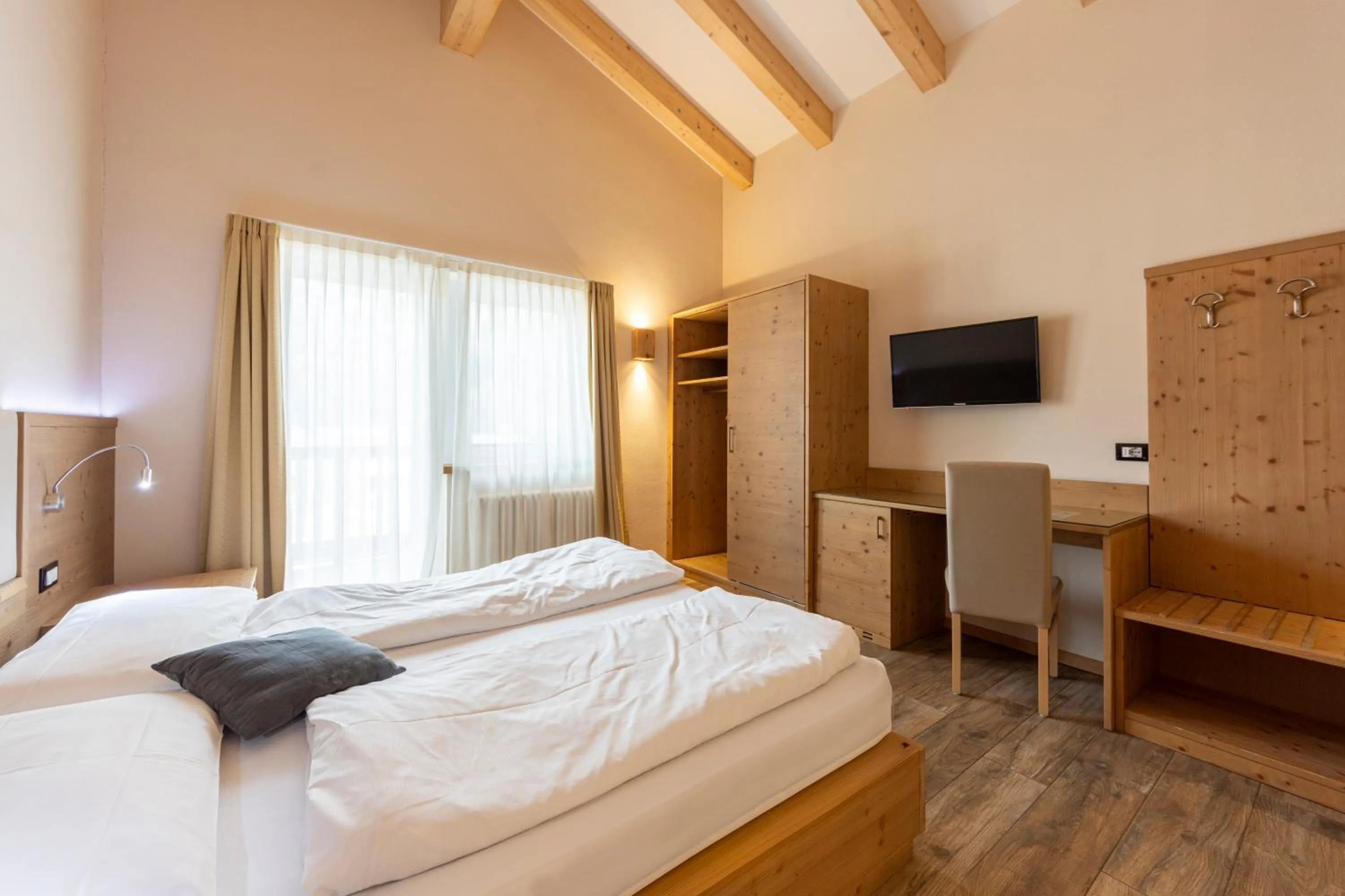 Bed in Park Hotel Avisio