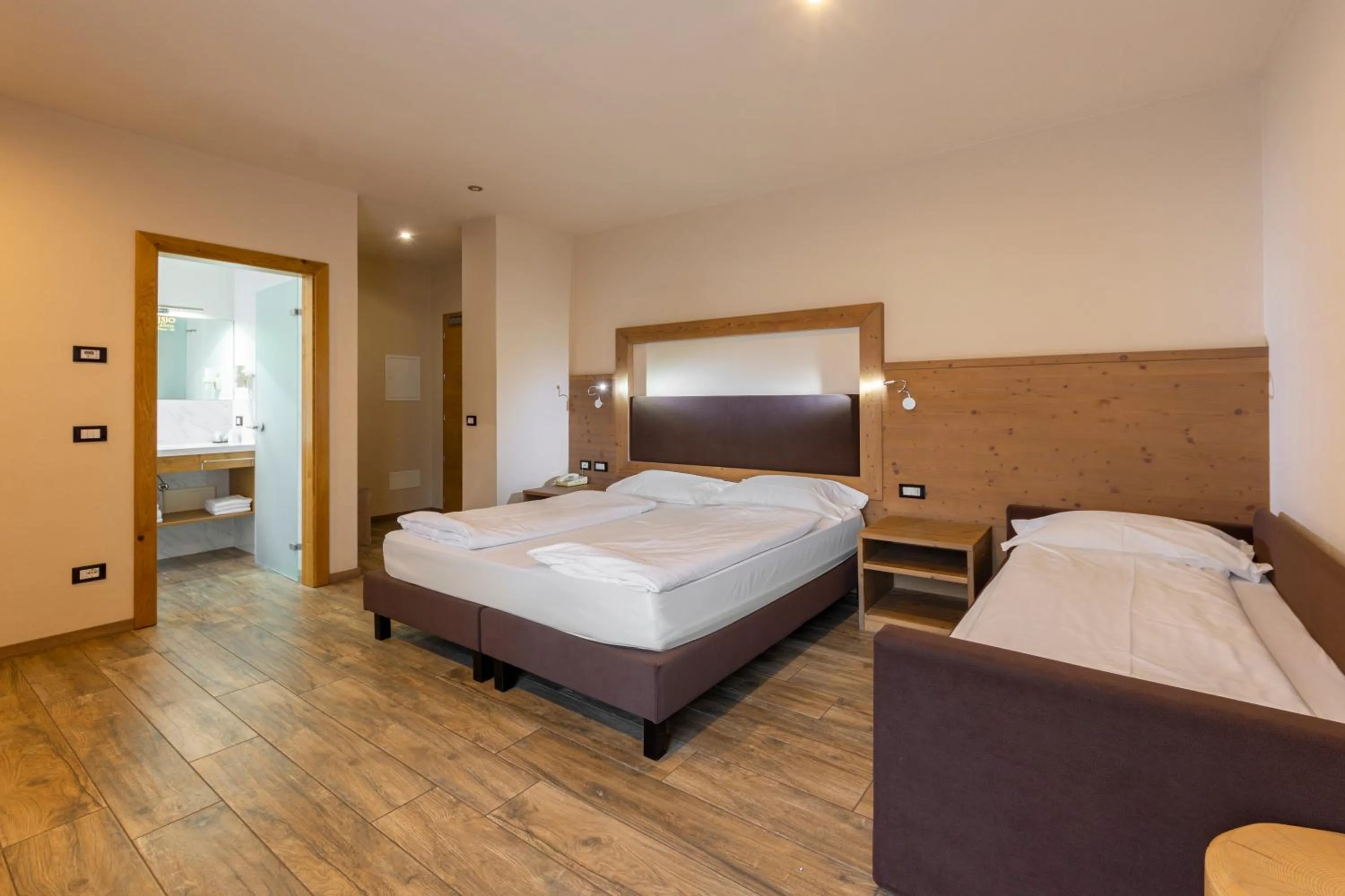 Bed in Park Hotel Avisio