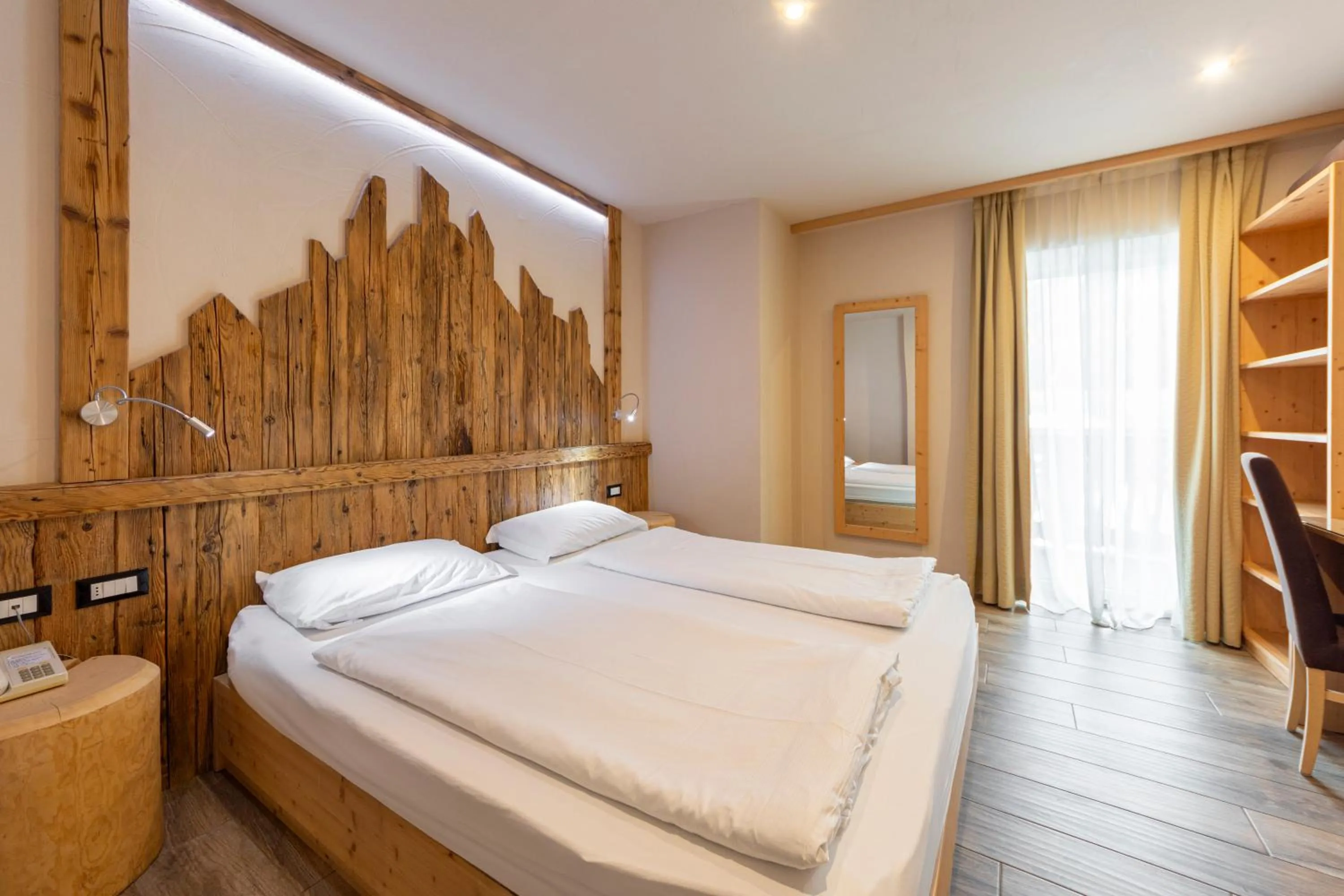 Bed in Park Hotel Avisio