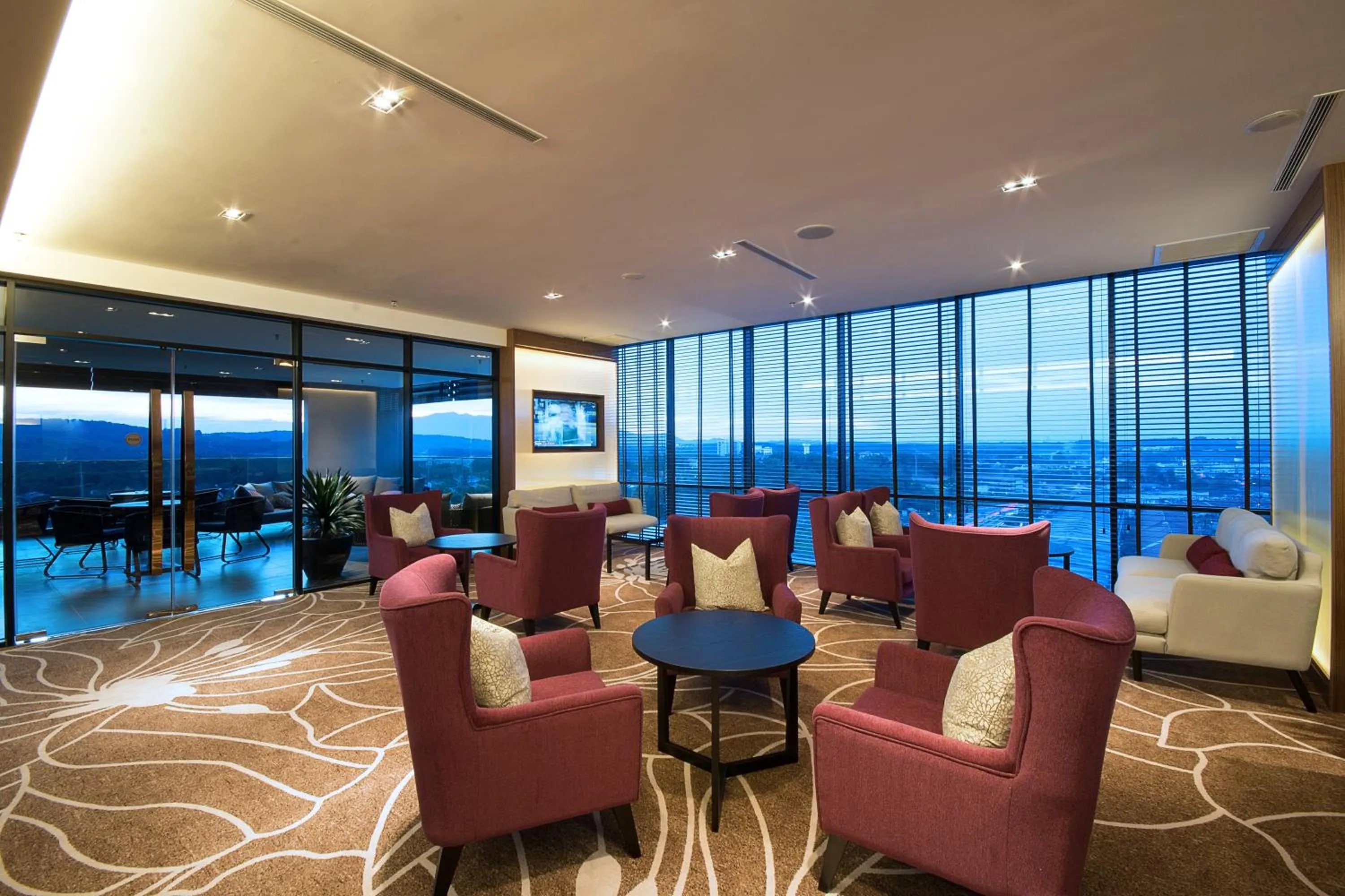 Communal lounge/ TV room in Impiana Hotel Senai