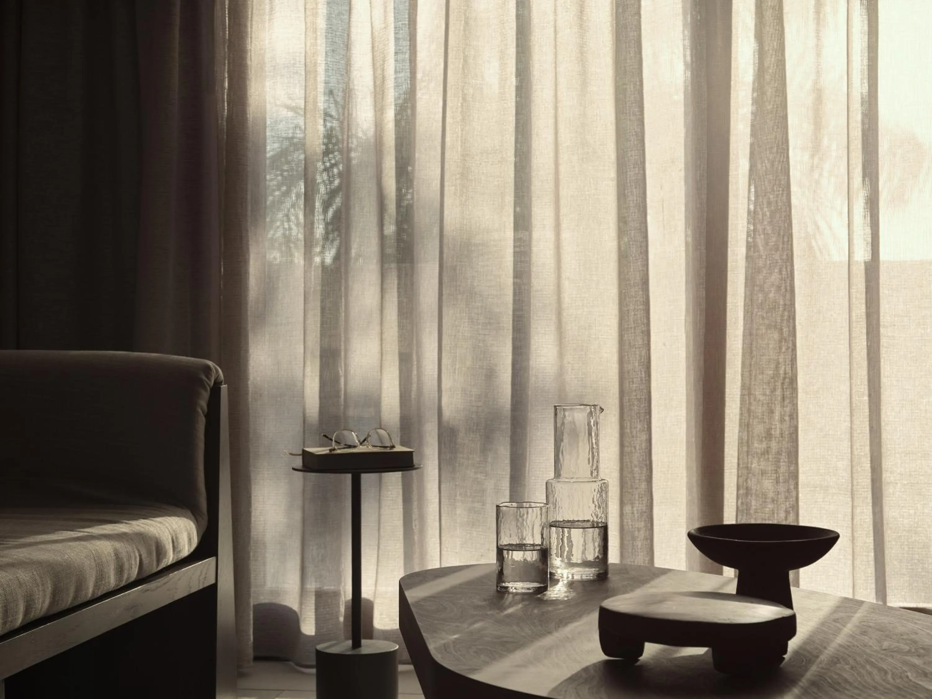 Living room in Lindian Village, Curio Collection by Hilton