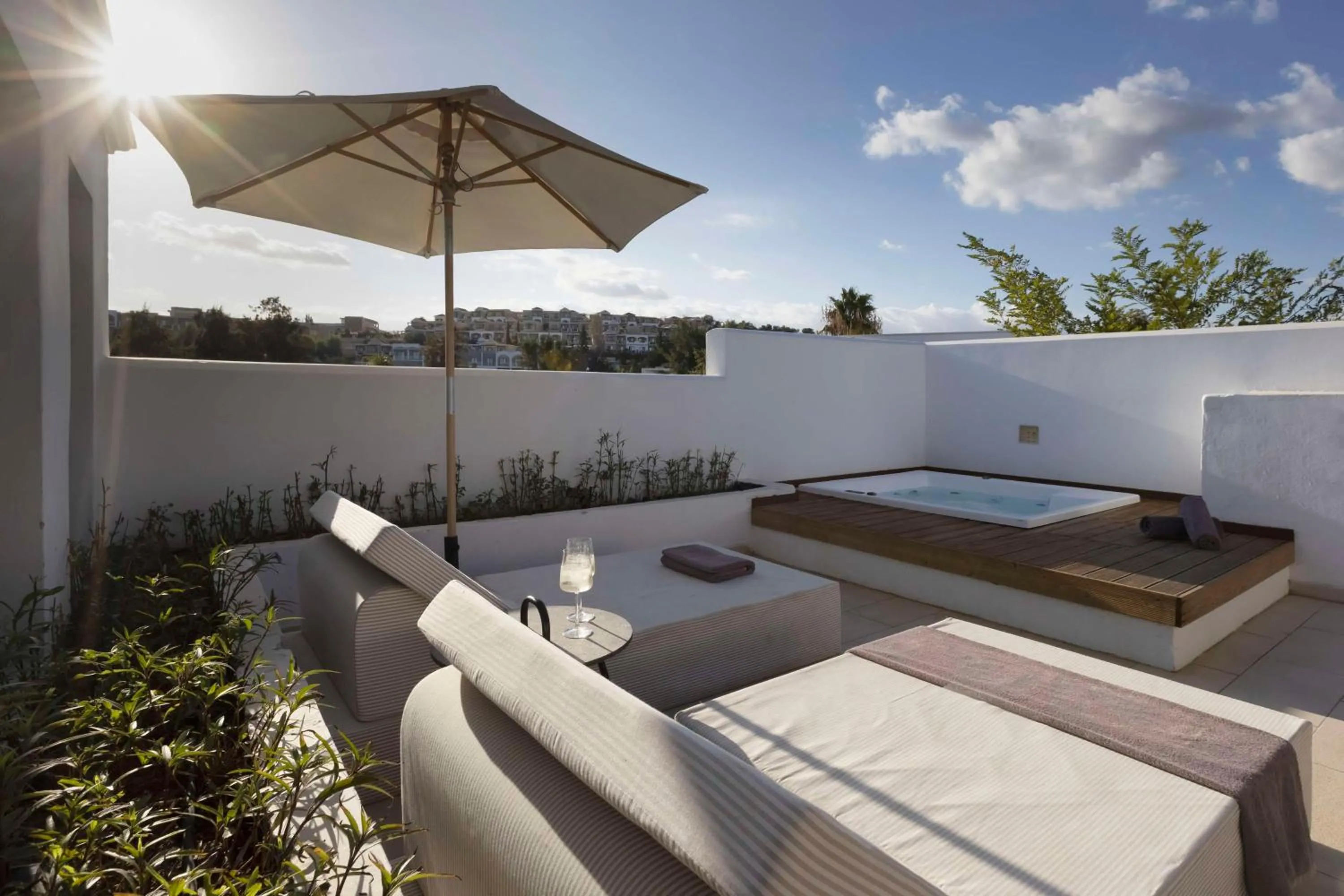 Living room in Lindian Village, Curio Collection by Hilton