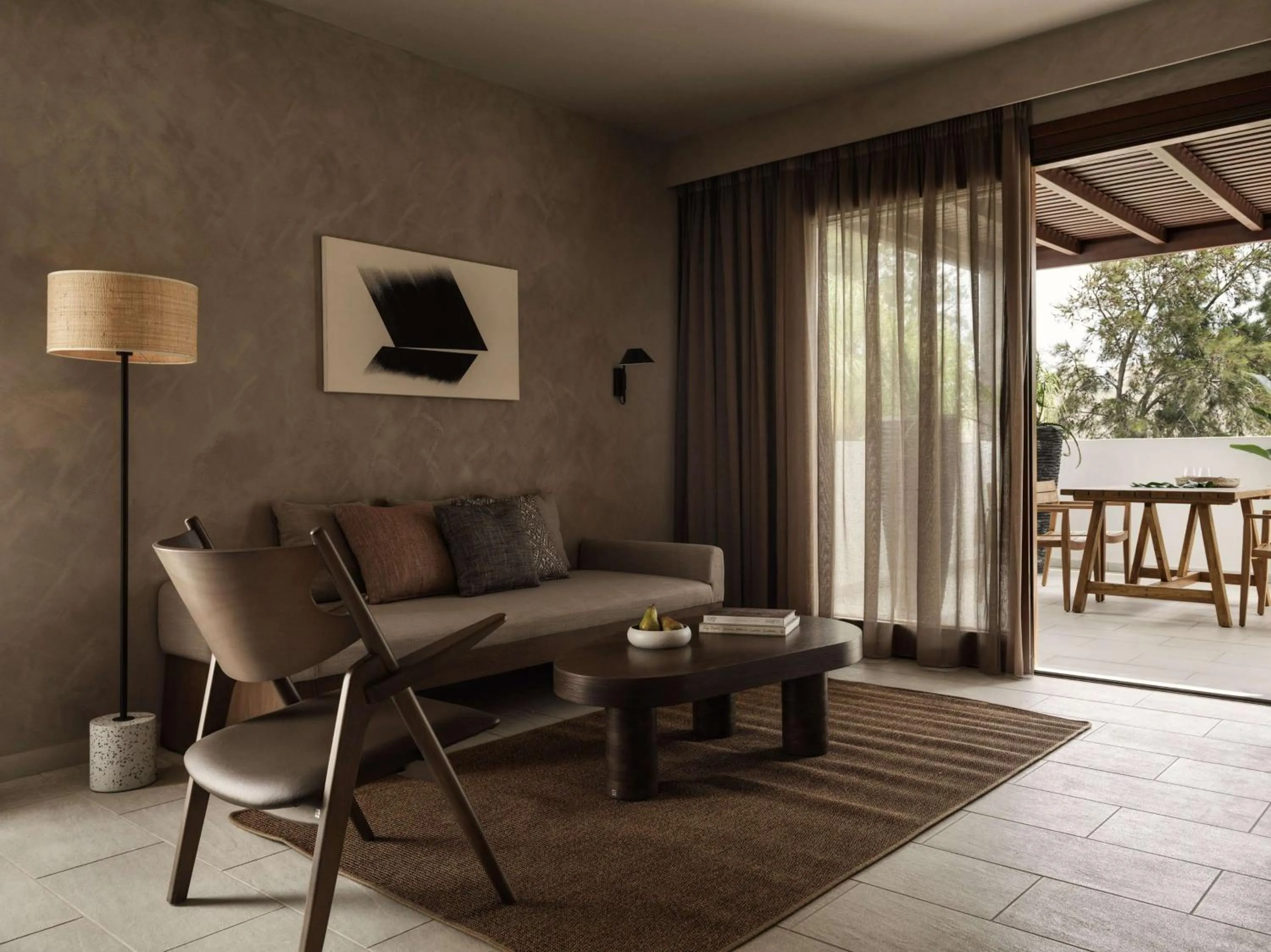 Living room in Lindian Village, Curio Collection by Hilton