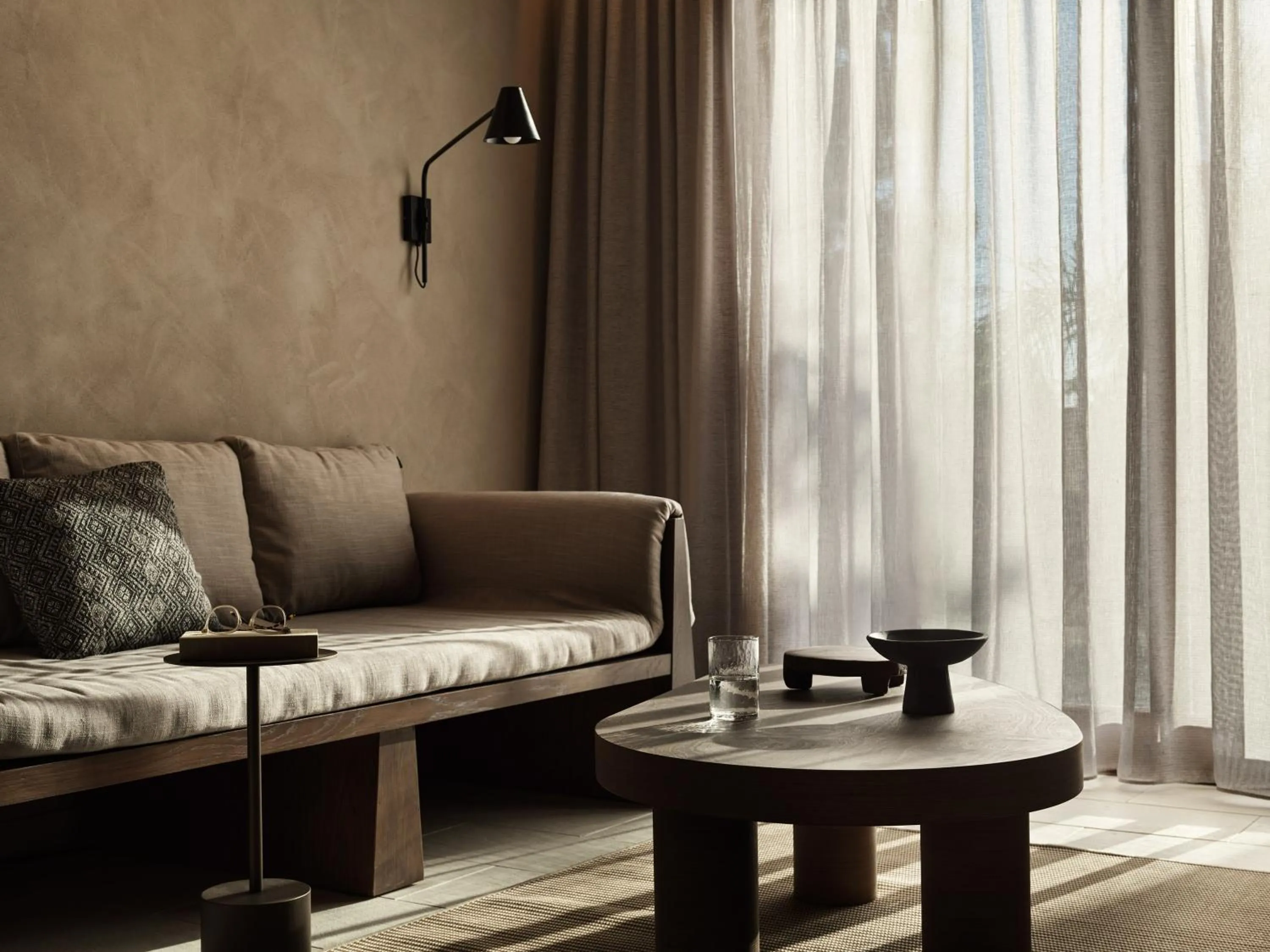 Living room in Lindian Village, Curio Collection by Hilton