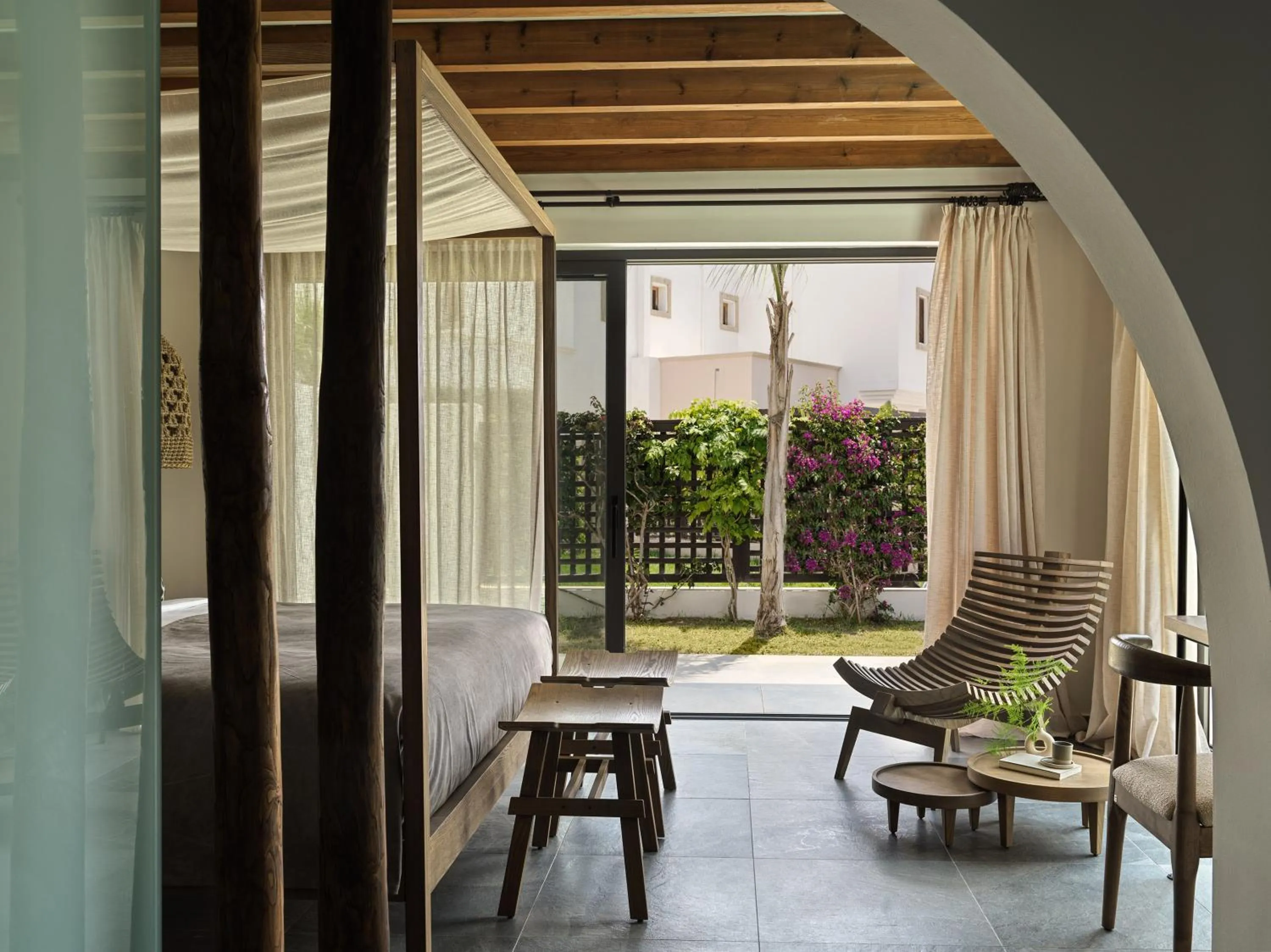 Bed in Lindian Village, Curio Collection by Hilton