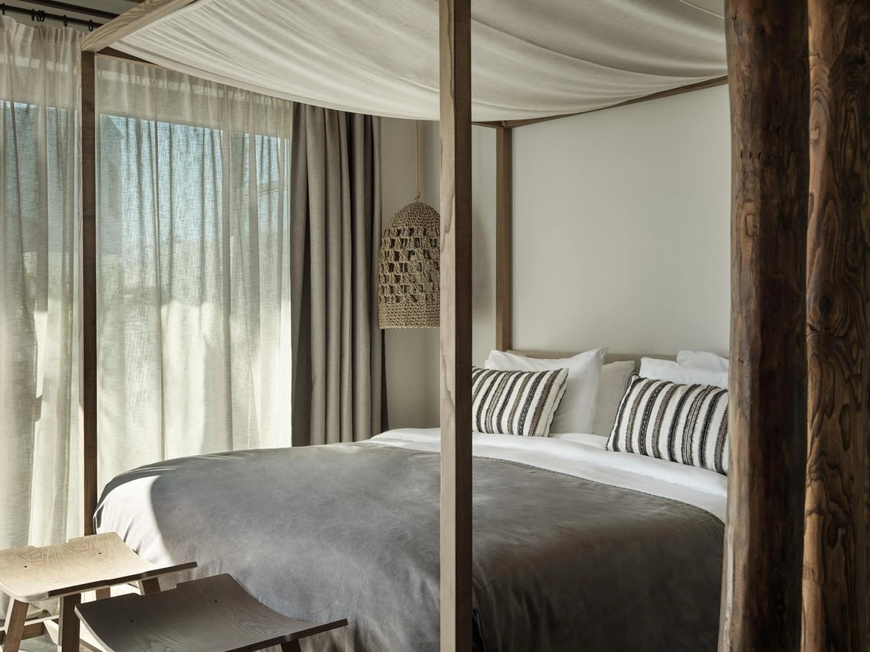 Bed in Lindian Village, Curio Collection by Hilton