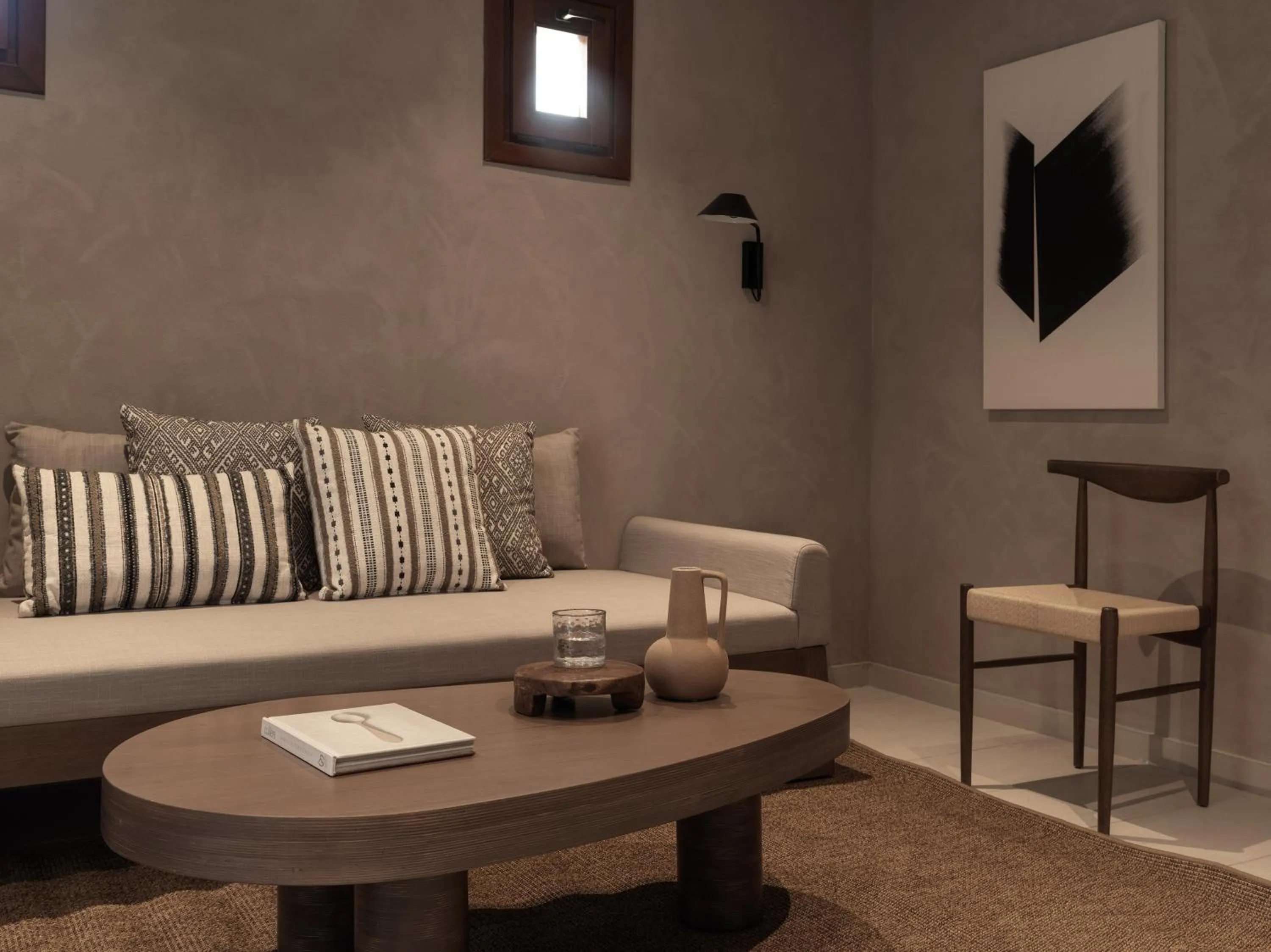 Living room in Lindian Village, Curio Collection by Hilton