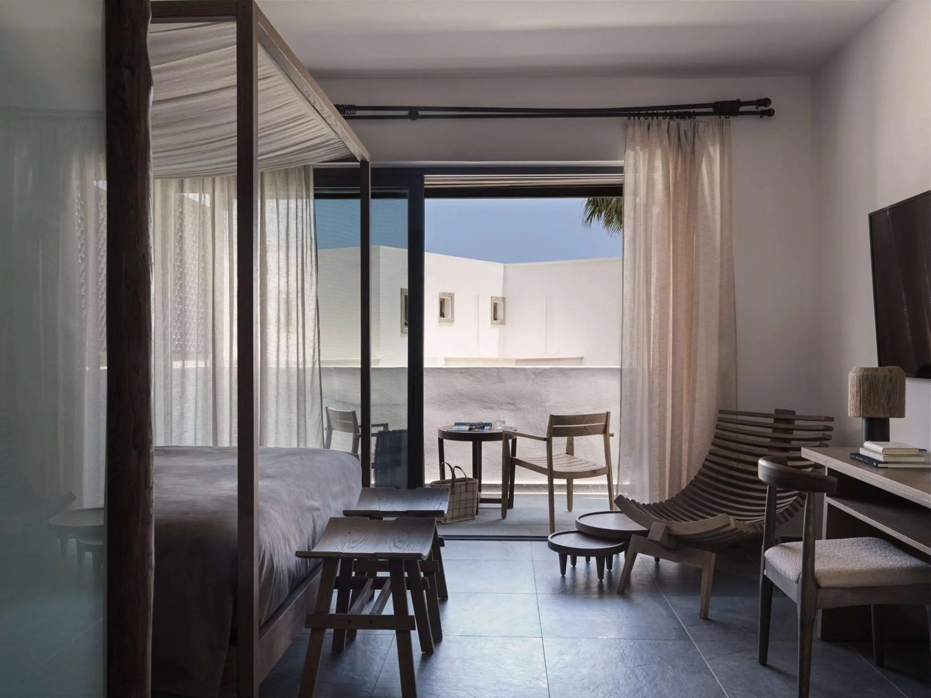 Living room in Lindian Village, Curio Collection by Hilton