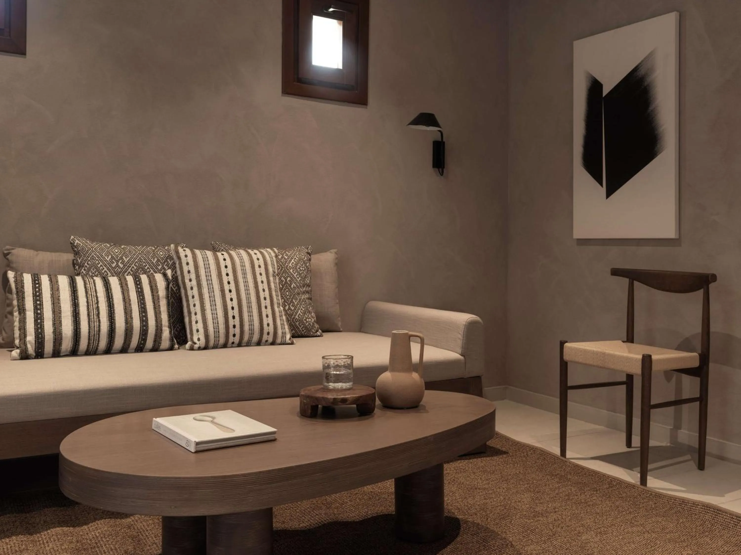 Living room in Lindian Village, Curio Collection by Hilton