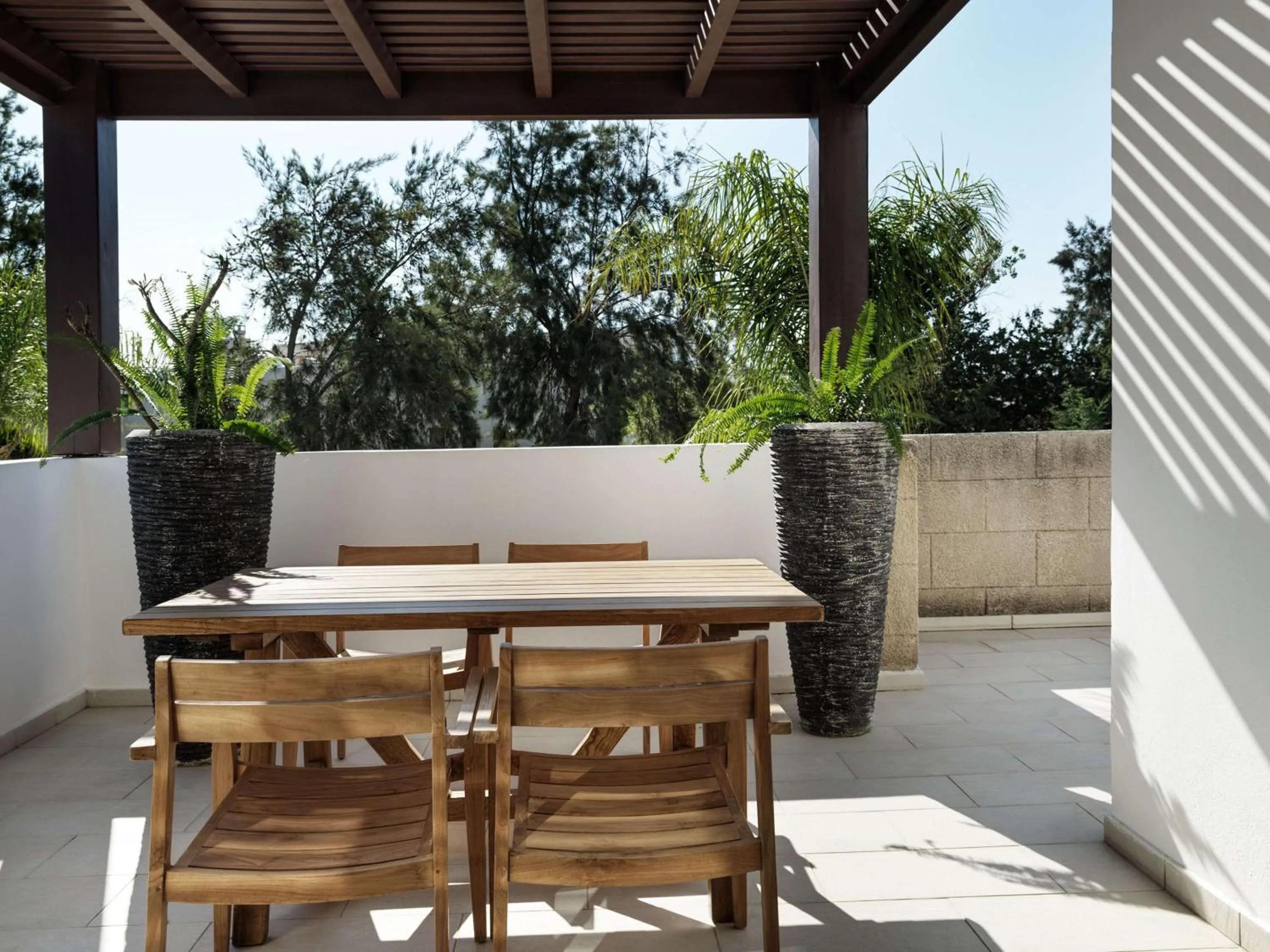 Living room in Lindian Village, Curio Collection by Hilton