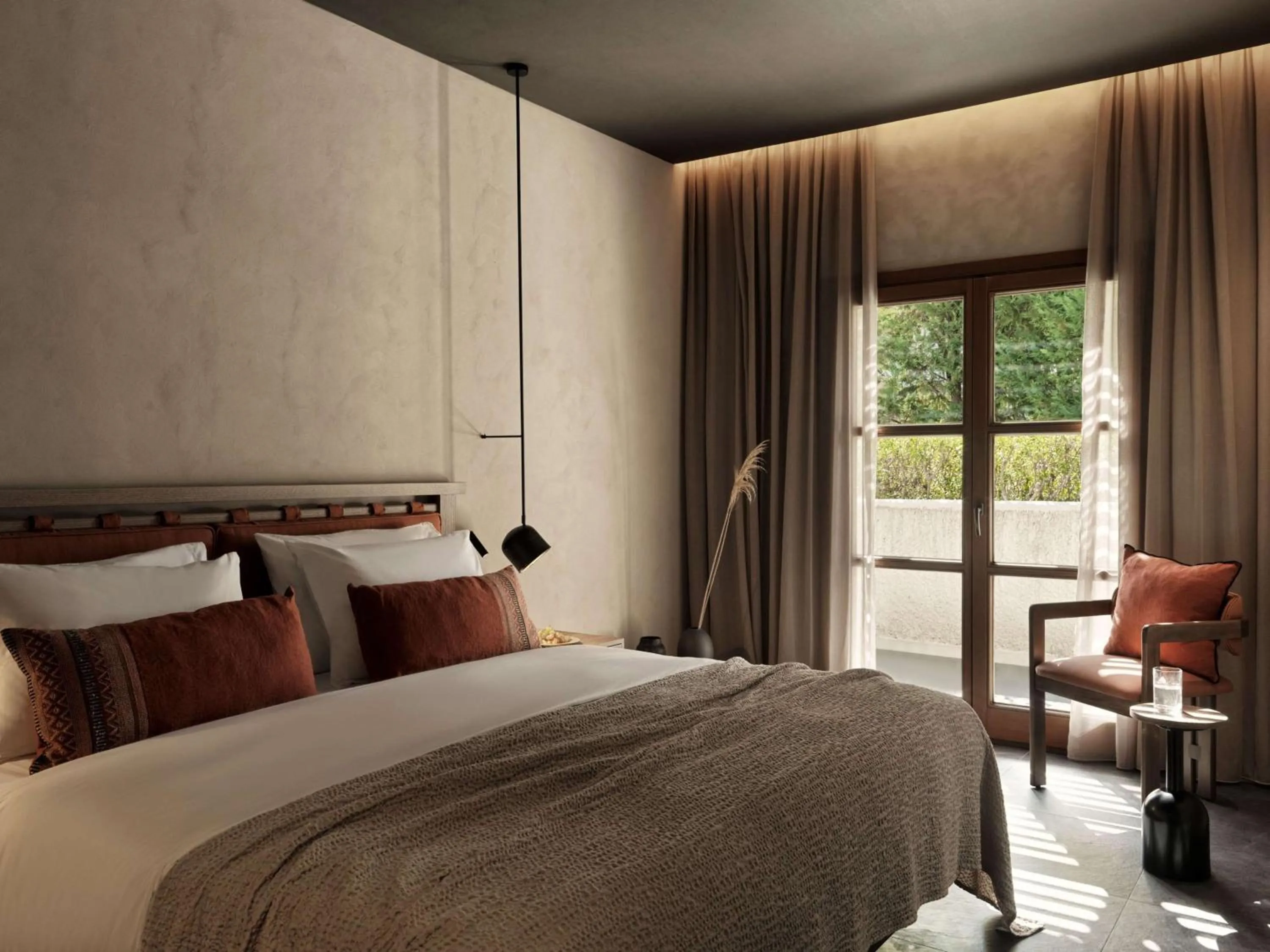 Bed in Lindian Village, Curio Collection by Hilton